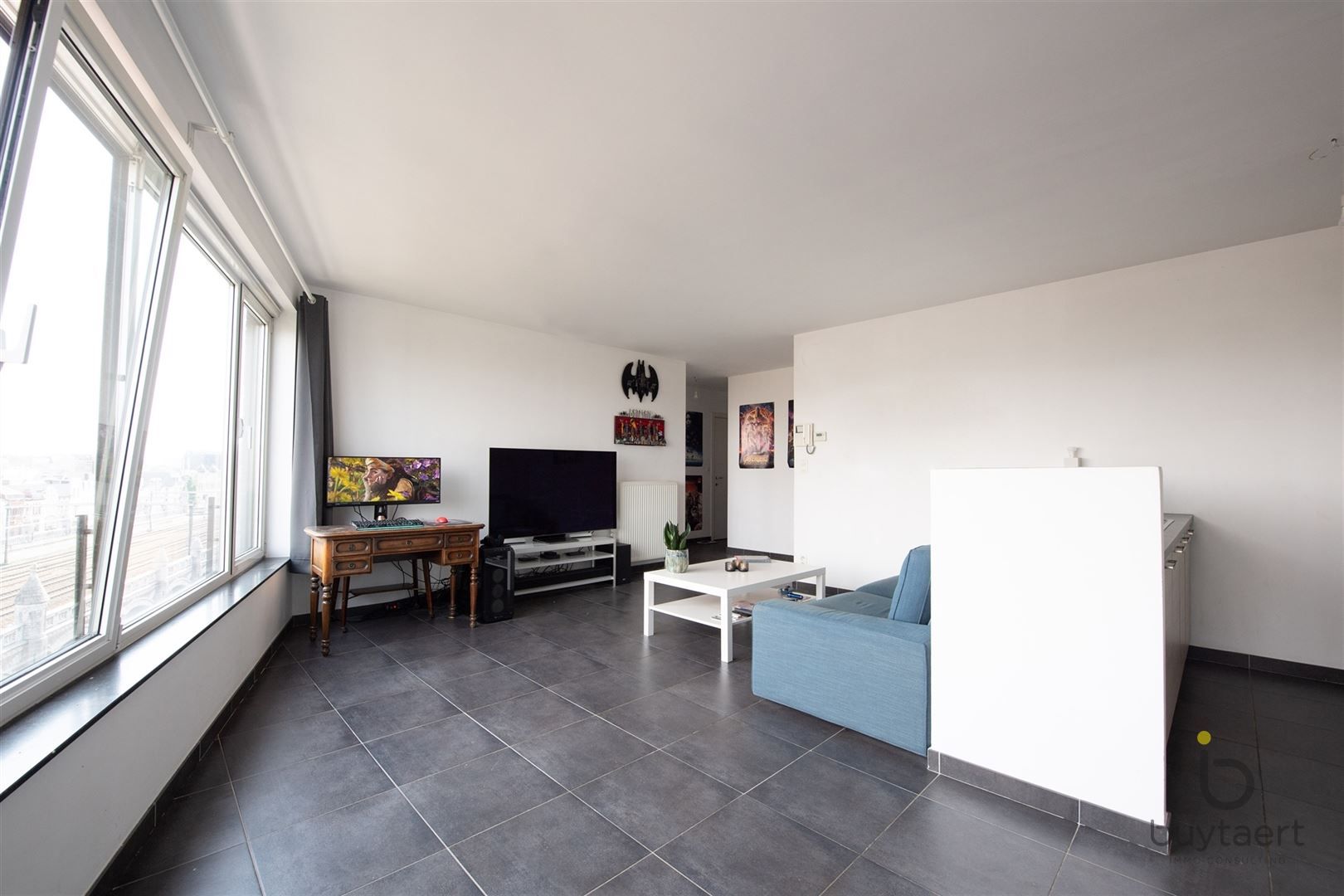 Lichtrijk hoekappartement met prachtig vergezicht over de stad + P foto 3