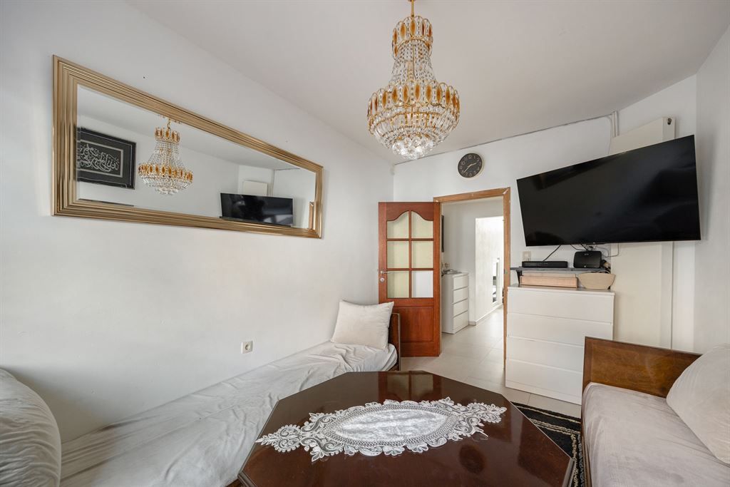 Ruime woning met 4 slaapkamers en stadskoer foto 4