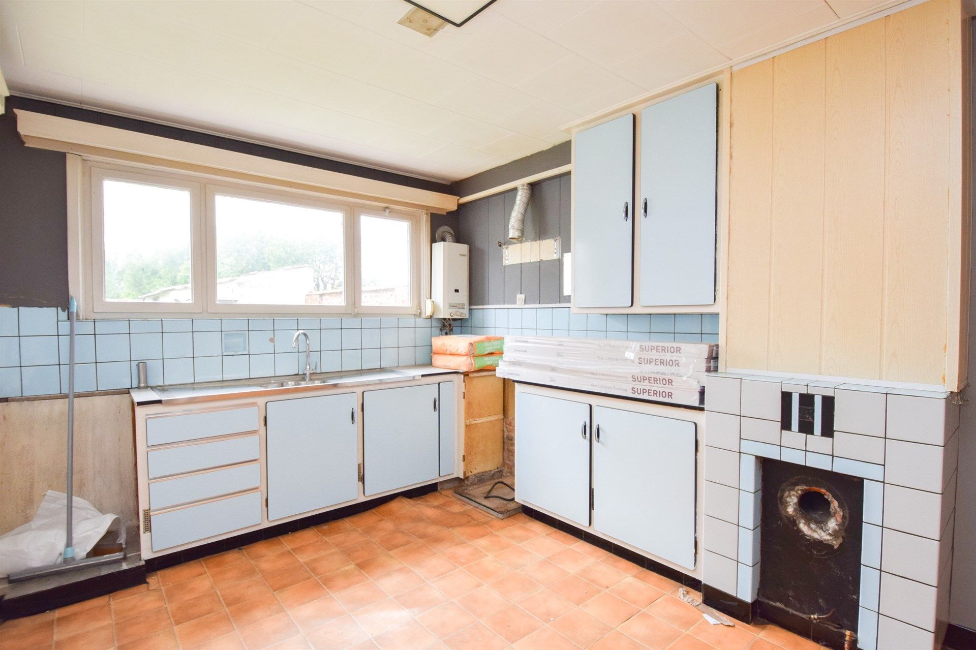 Te renoveren gezinswoning met ruime tuin in de dorpskern van De Klinge foto 8
