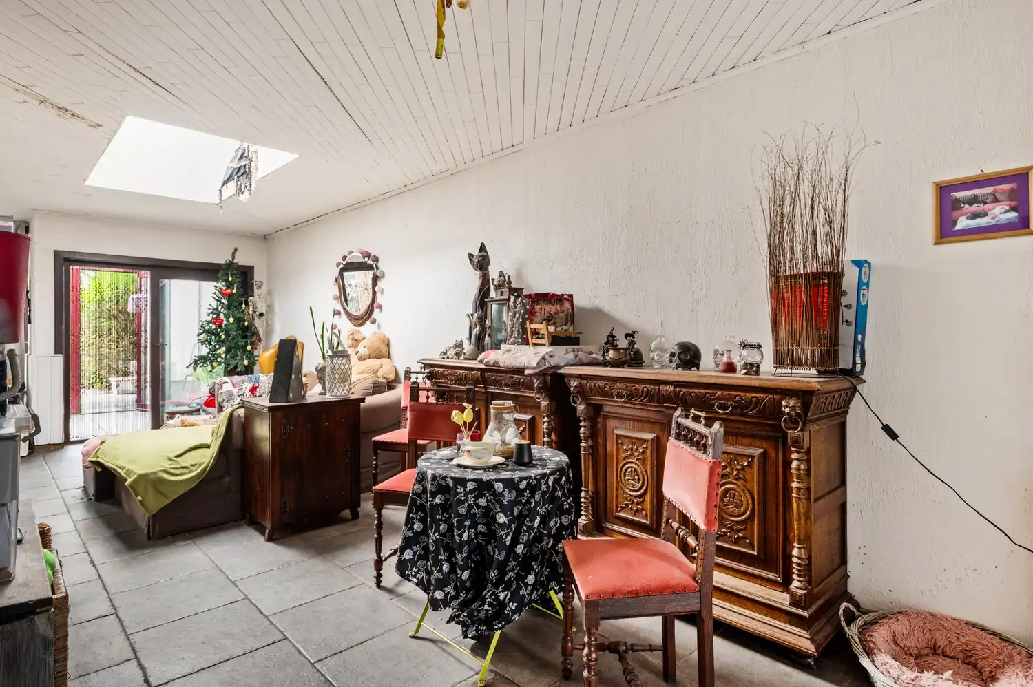 Gedeeltelijk te renoveren rijwoning met 3 slaapkamers, tuin en veel potentieel in Merksem! foto 6