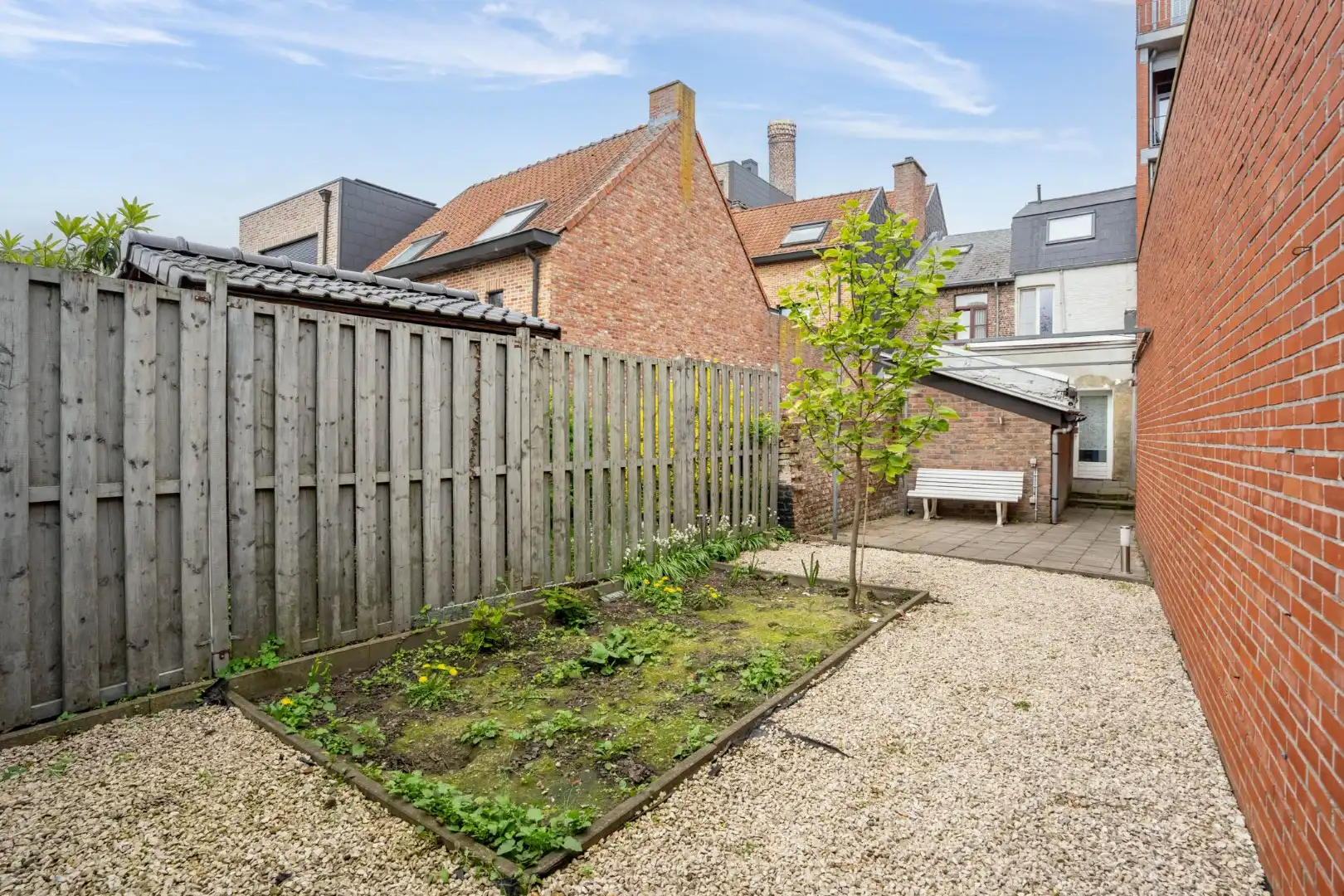 Een knusse rijwoning met tuintje en 3 slaapkamers, gelegen pal in het centrum van Maaseik. foto 22