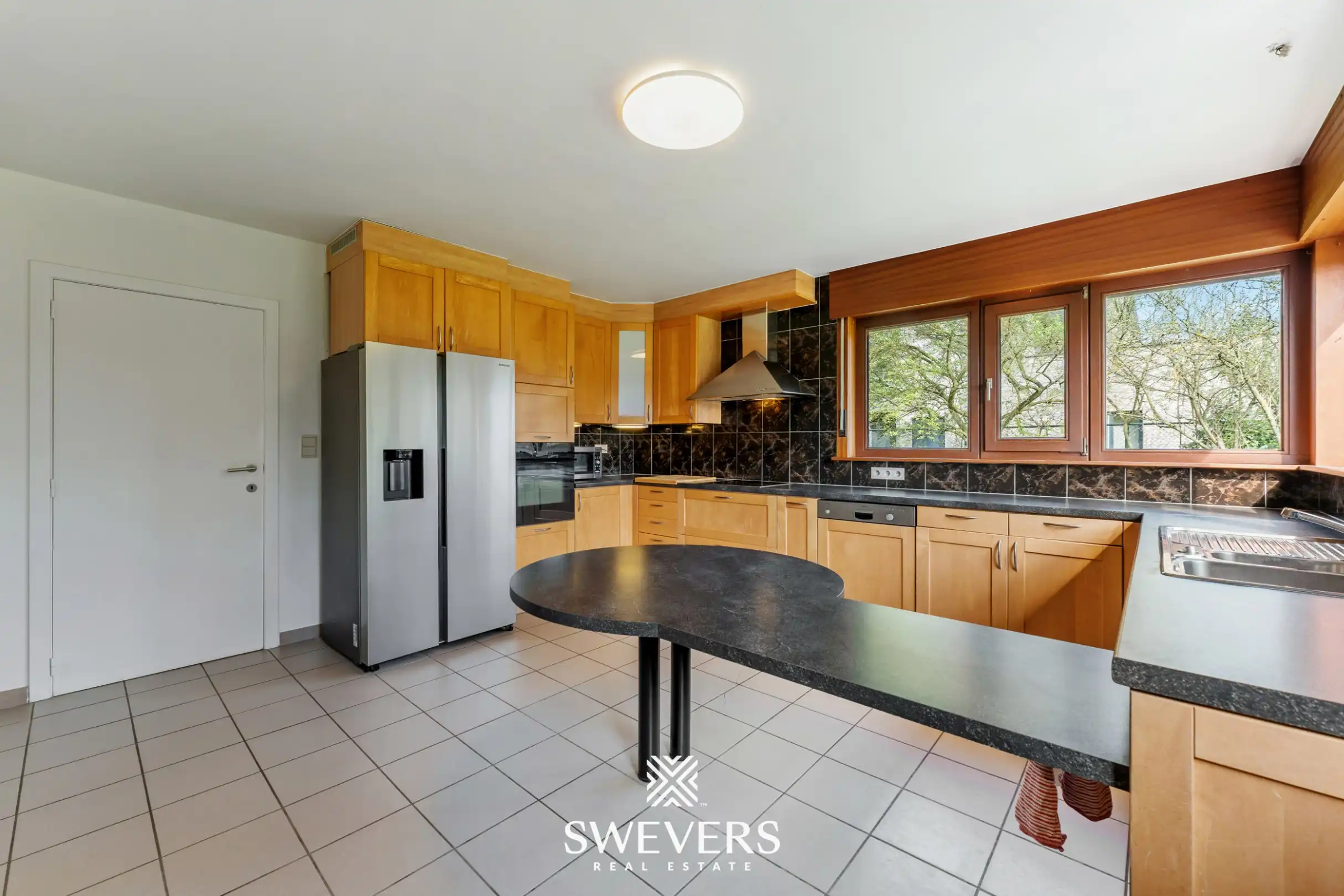 Zeer ruime woning met praktijkruimte op 28a 69ca in Heusden-Zolder foto 12