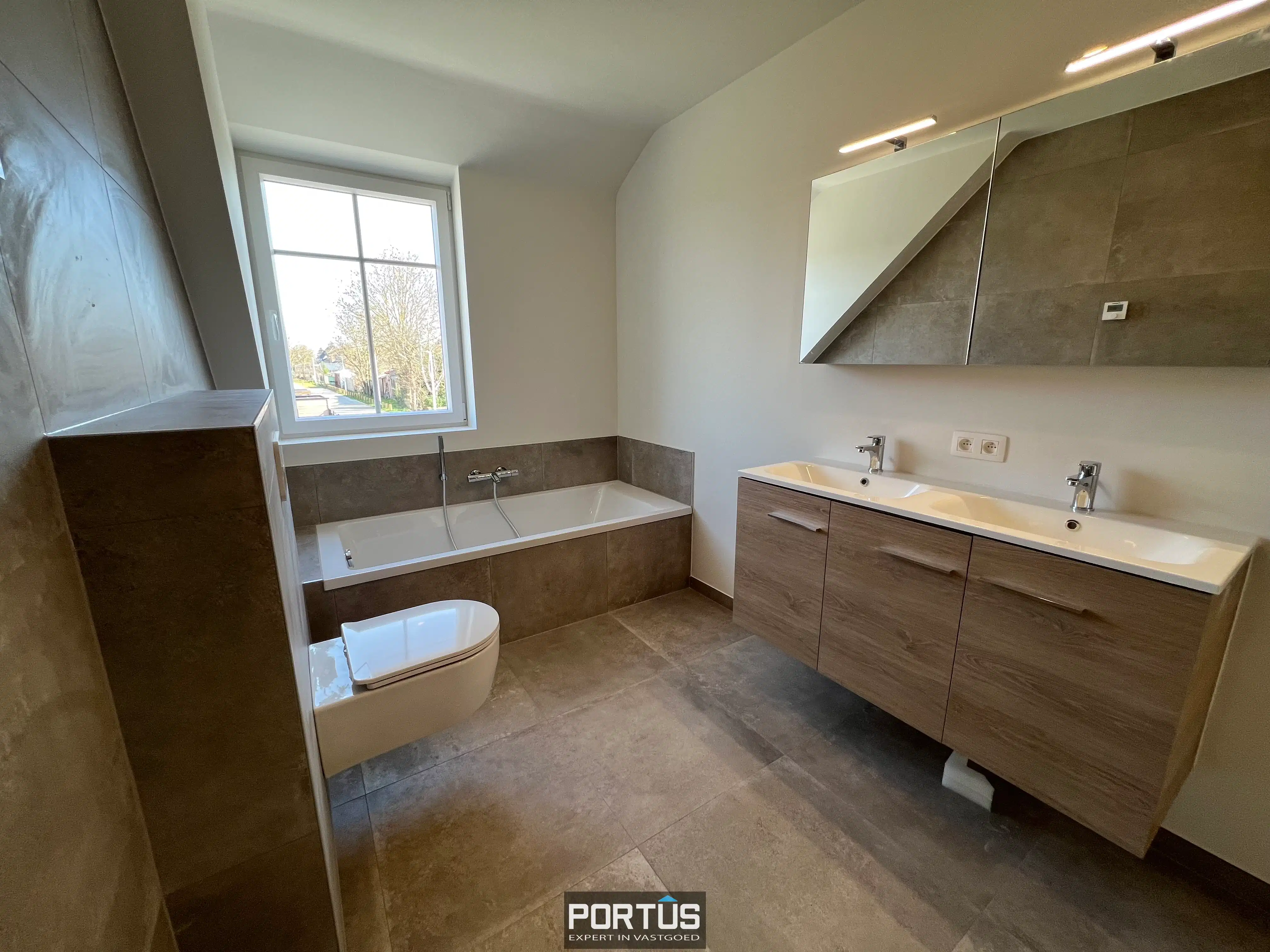 Energiezuinige nieuwbouwwoning met 3 slaapkamers en carport te huur foto 15