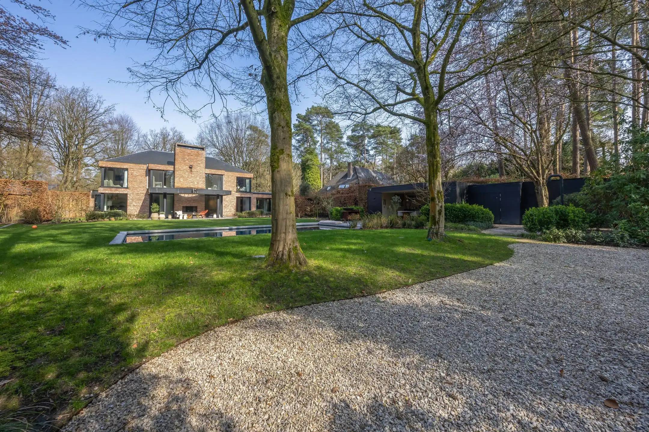 Architectenvilla met zwembad en ZW tuin in Hof Ter Linden foto 36