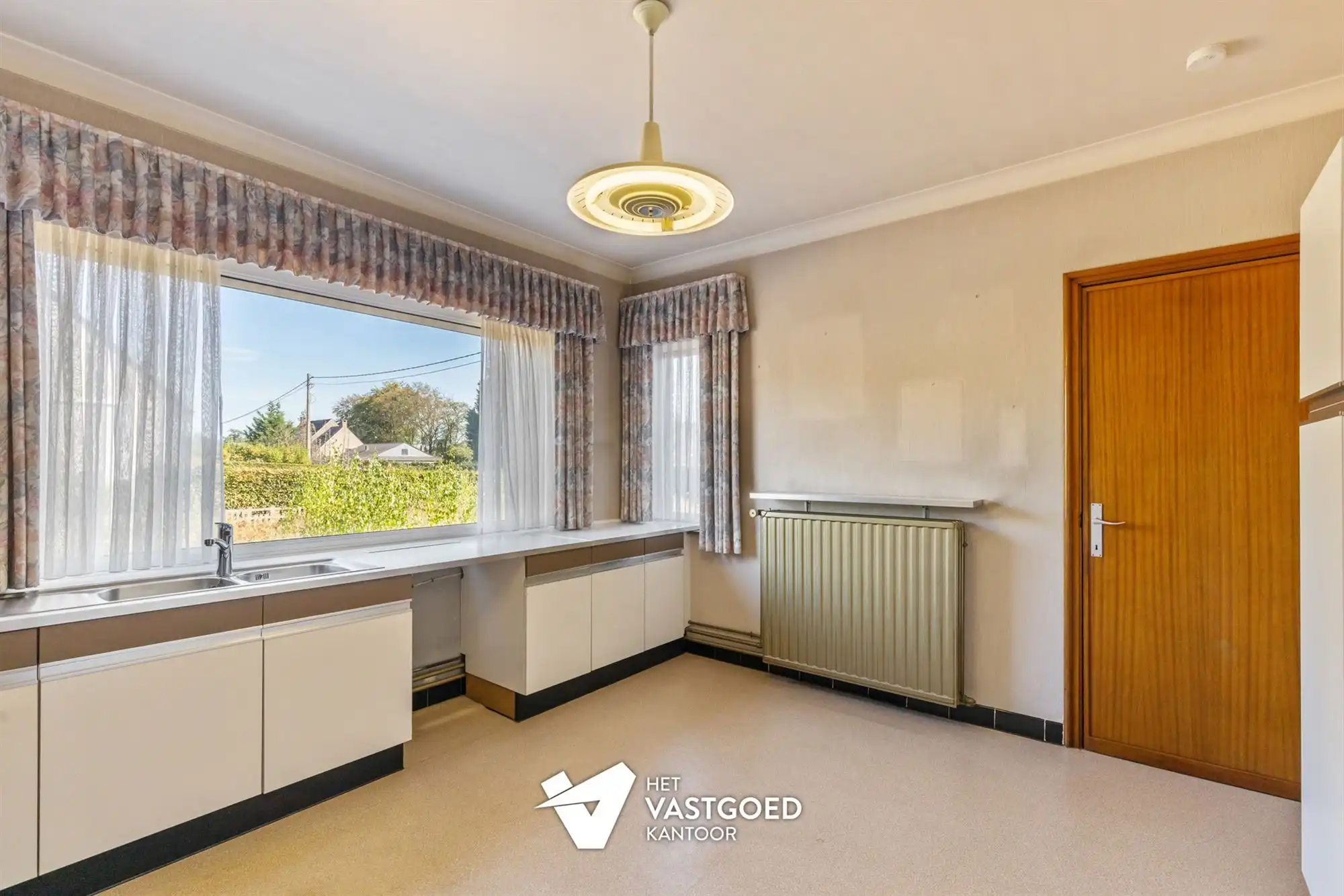WONING MET POTENTIEEL (155M²) MET 3 SLAAPKAMERS EN GARAGE OP EEN PERCEEL VAN 12 ARE TE TESSENDERLO foto 9