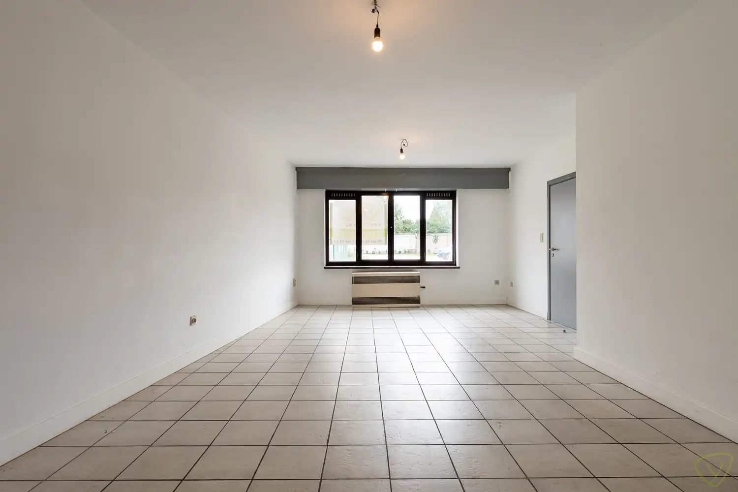 Ruim gelijkvloersappartement met private garage in de Kaaistraat! foto 18