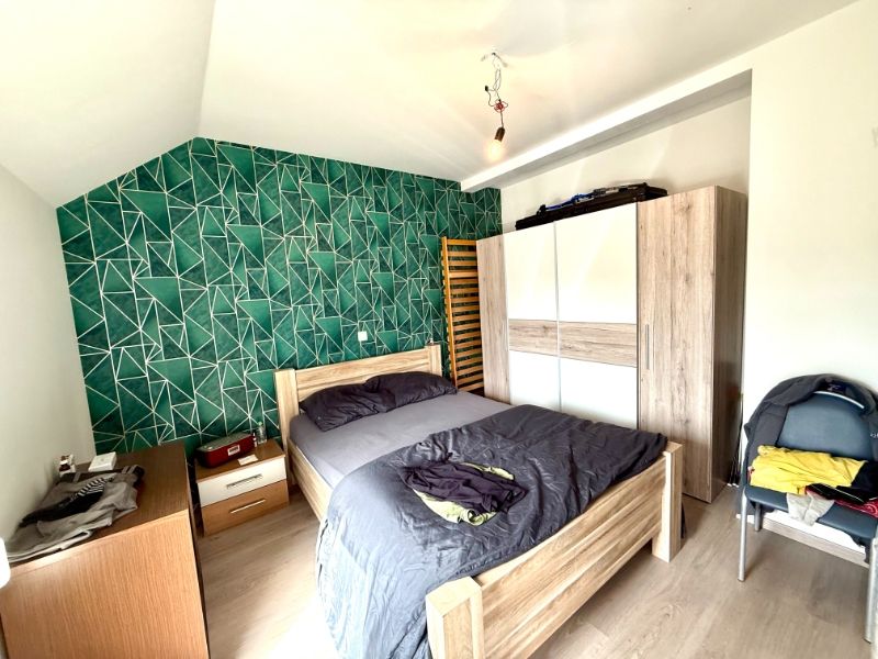 Moderne rijwoning met 2 slaapkamers, tuin en parkeerplaats foto 16