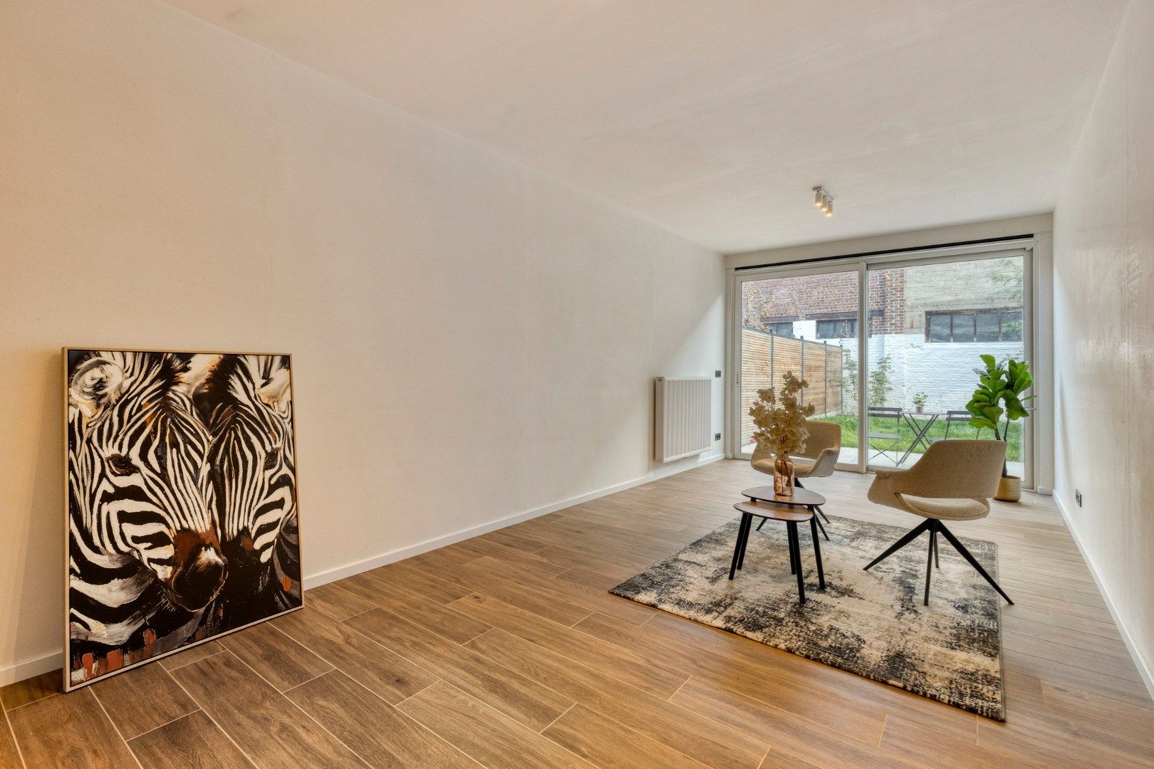 Instapklare stadswoning met 3 slaapkamers en tuintje!  foto 2