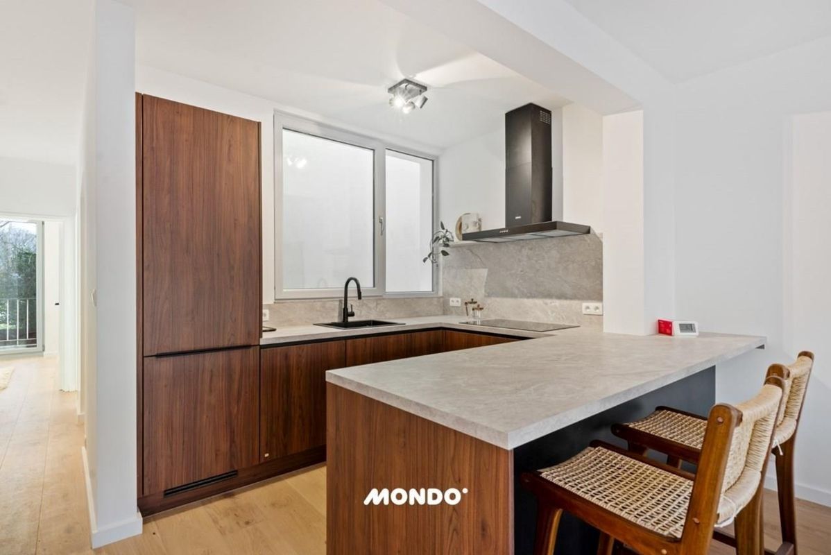 Instapklaar compleet gerenoveerd appartement met tuin EPC B foto 2
