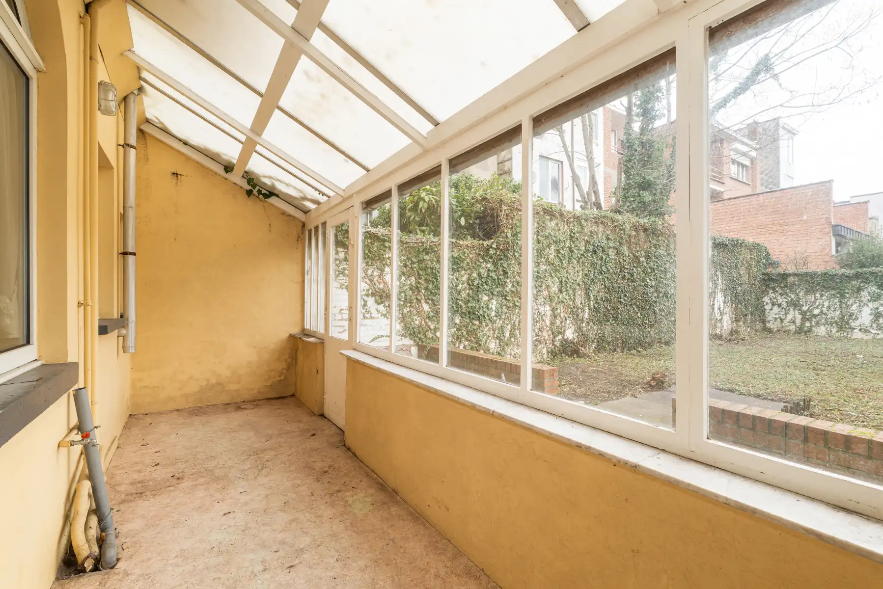 Investeringseigendom met 3 appartementen en tuin foto 6
