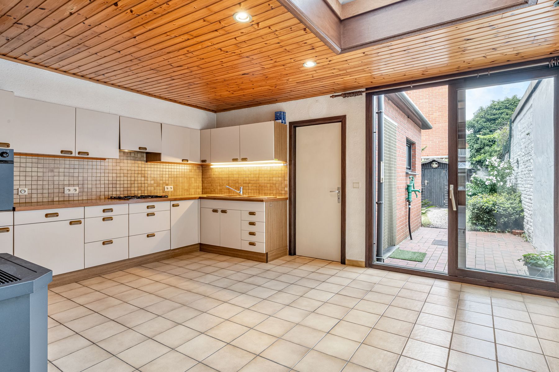 Authentieke burgerswoning met 4 slaapkamers en tuin! foto 10