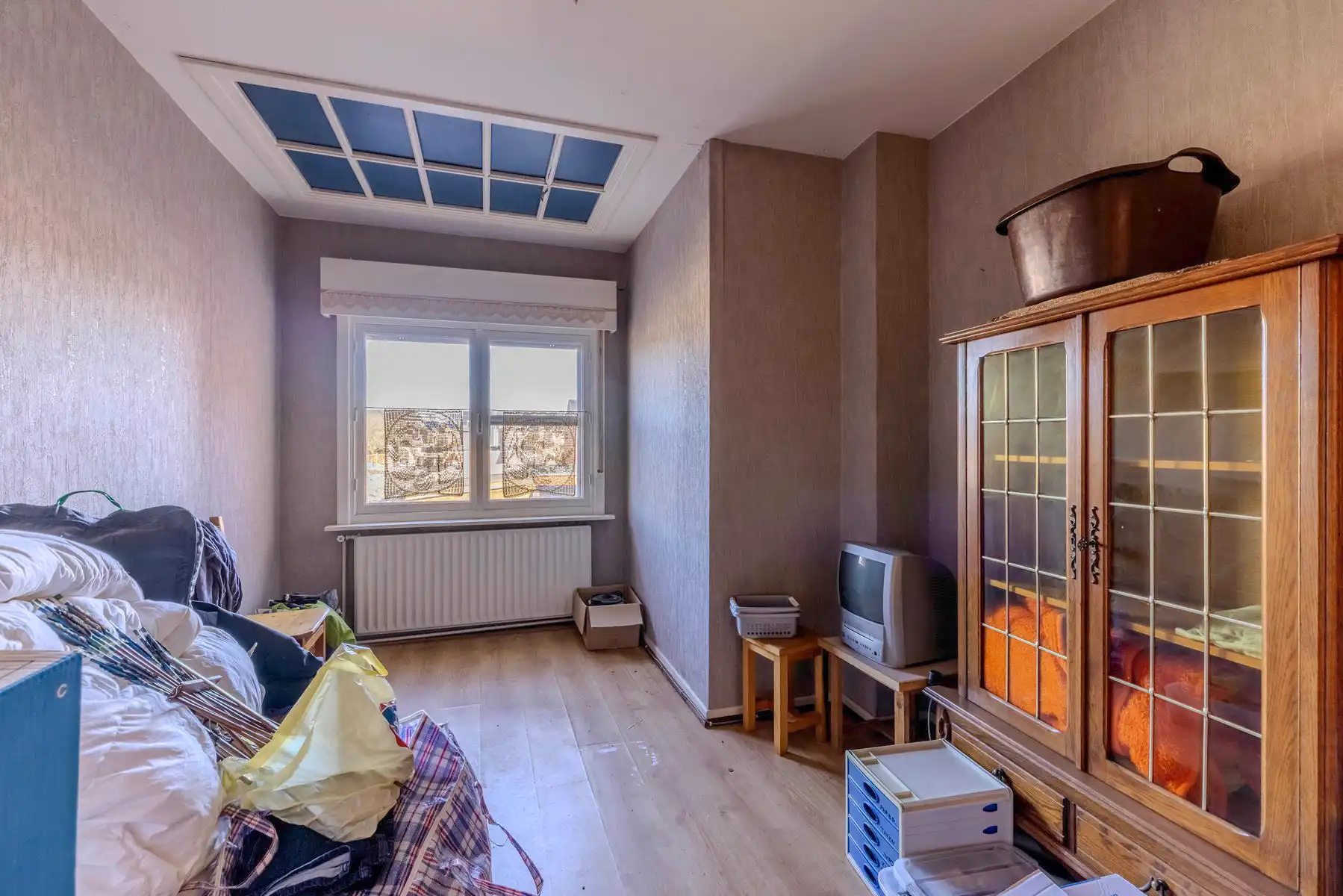 Te renoveren woning met 3 slpk, inpandige garage en tuin foto 18