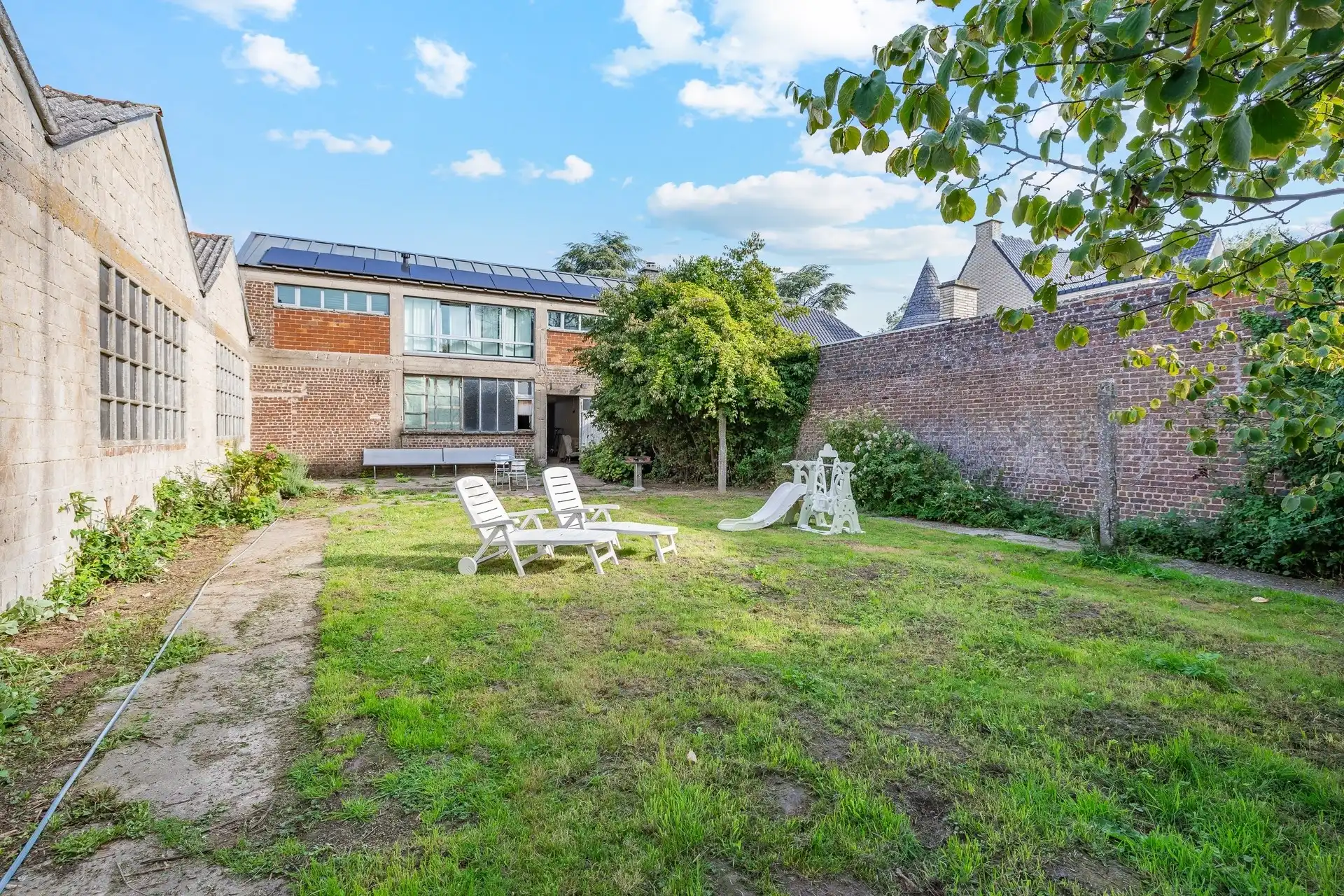 Karaktervol herenhuis met art-decoallure, ruime magazijnen en zuidgerichte tuin  foto 33