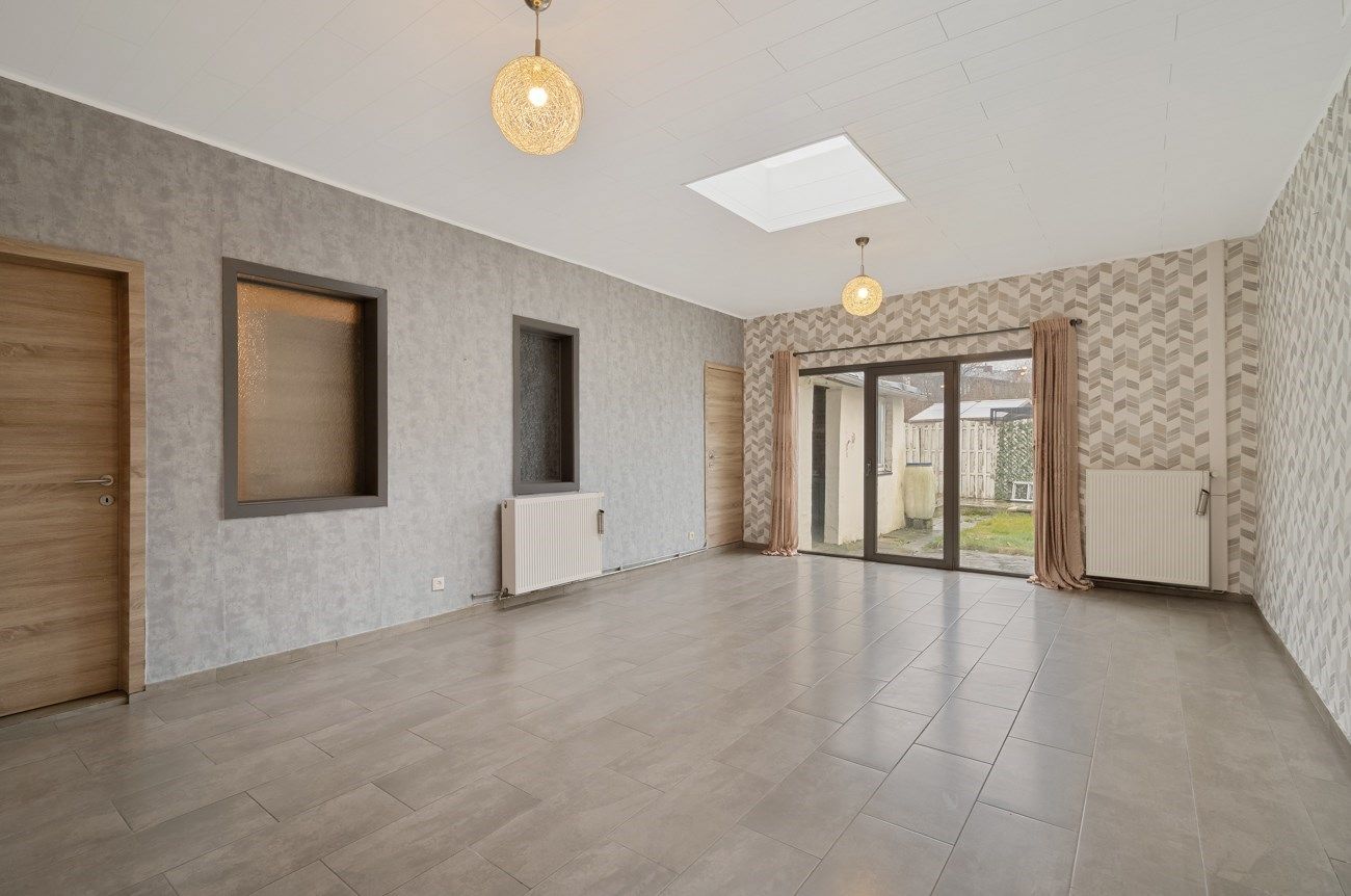 Ruime woning met tuintje en terras. foto 6