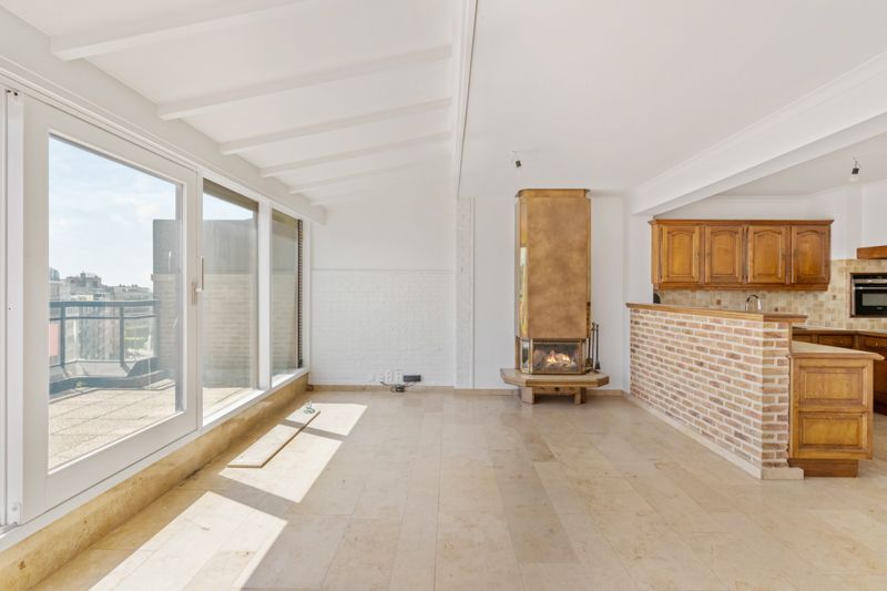 Schitterend gelegen 1 slpk penthouse met royaal dakterras foto 3