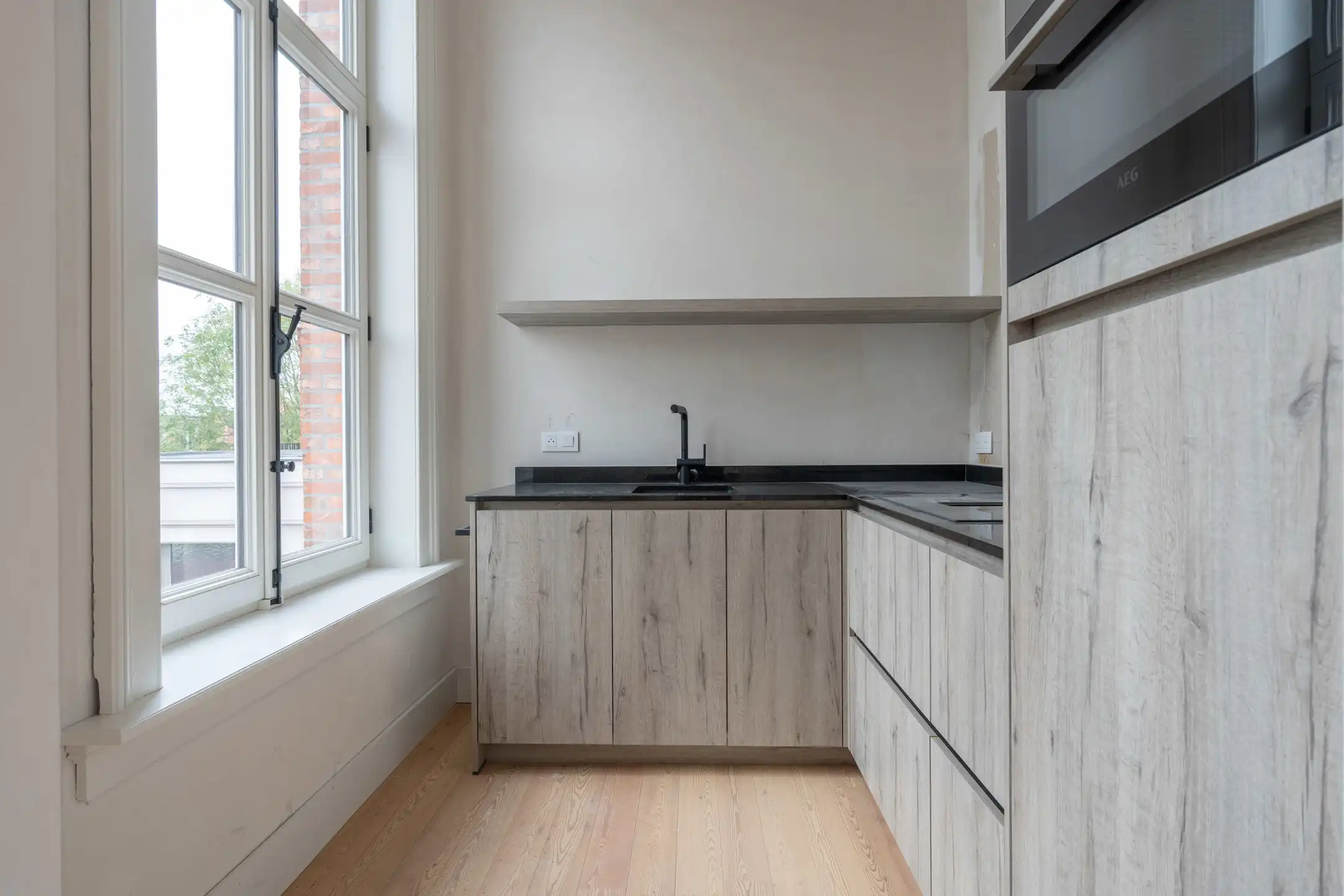 Uniek en stijlvol appartement in een mooi stukje erfgoed foto 10