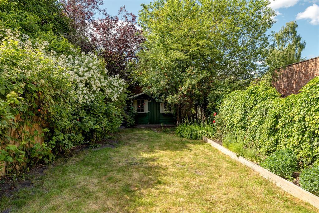 Gelijkvloers appartement met tuin en garage foto 6