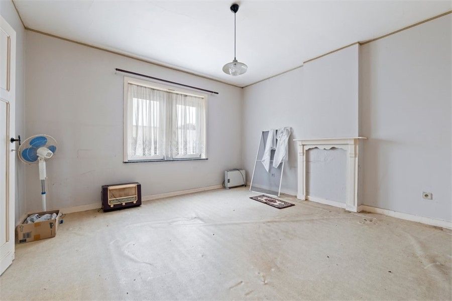 TE RENOVEREN GEZINSWONING MET LOODS IN HET LANDELIJKE GINGELOM foto 24