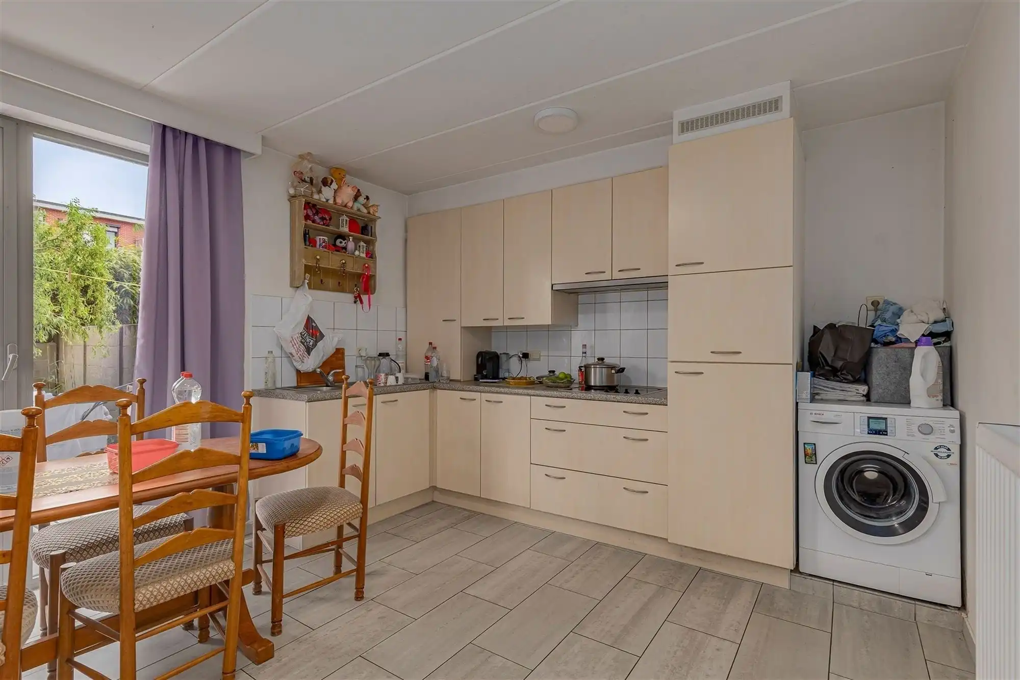 Lichtrijk 1-slaapkamer appartement met tuin en garagebox te koop in Merksem foto 5