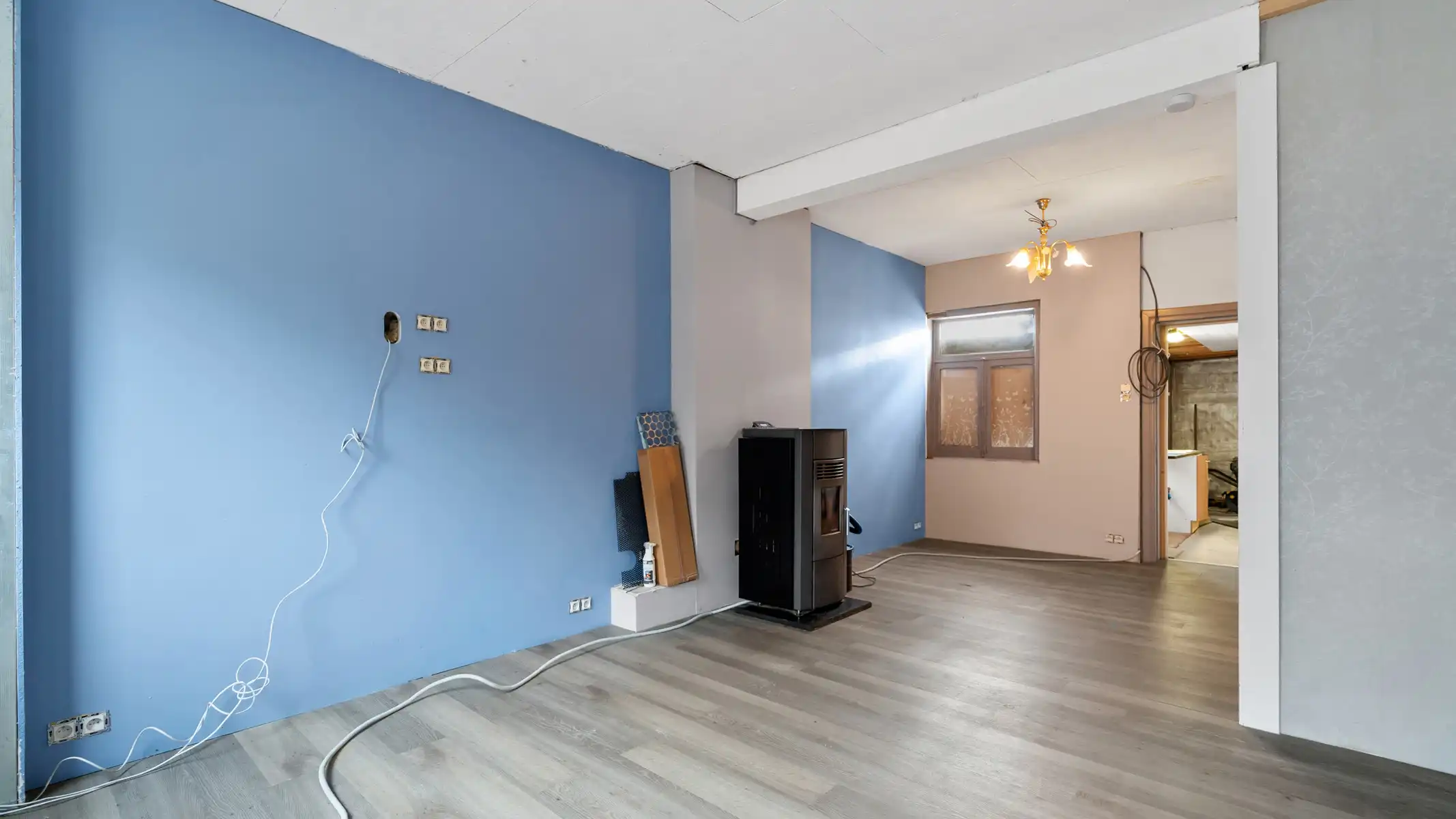 Deels te renoveren starterswoning met diepe tuin in groene, rustige omgeving foto 5