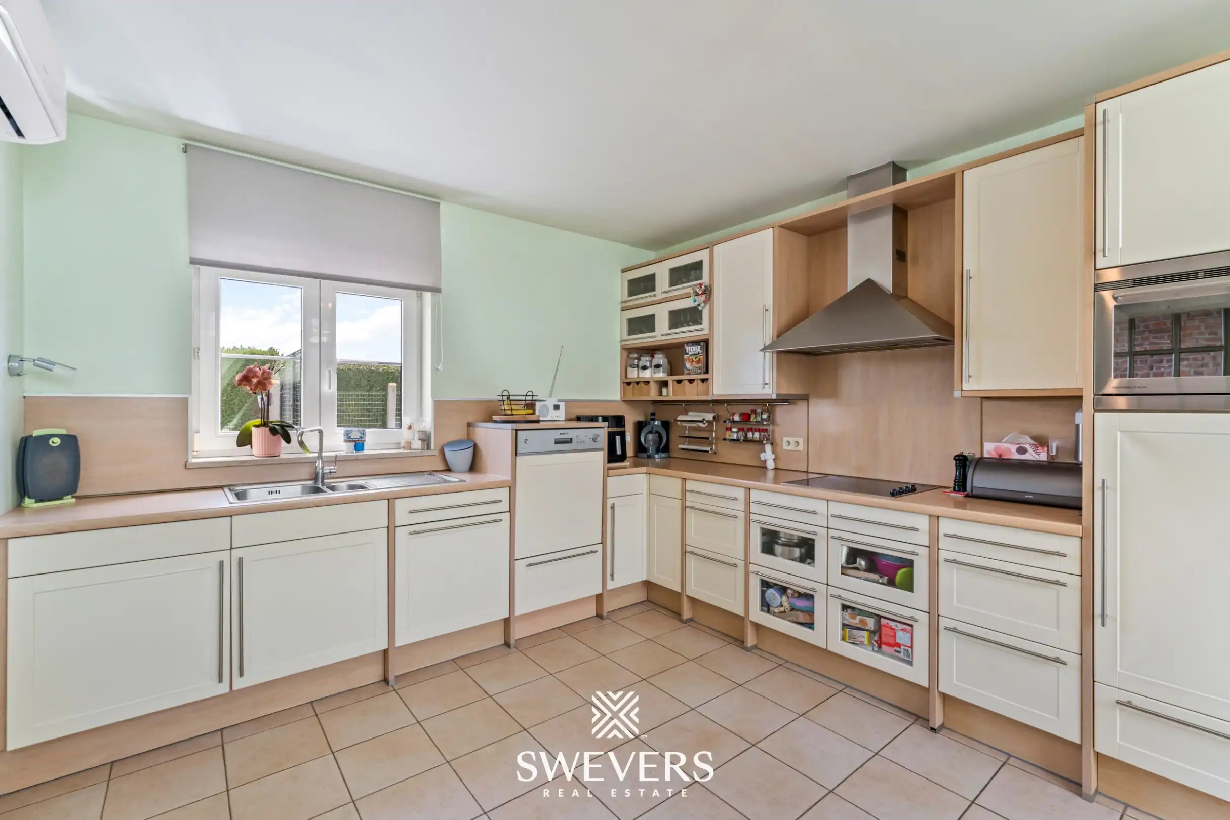 Instapklare woning met veel ruimte, 4 slaapkamers en zonnige tuin foto 10