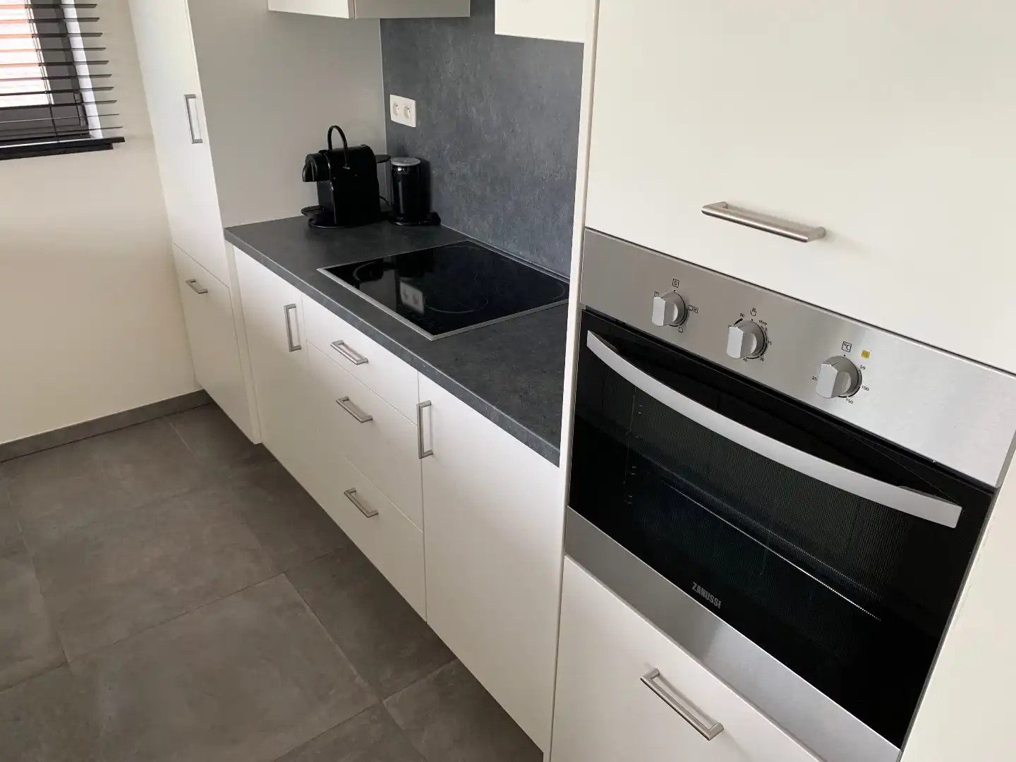 GEZELLIG APPARTEMENT MET 2 SLAAPKAMERS, TERRAS, KELDER EN 1 AUTOSTANDPLAATS TE BILZEN!  foto 13