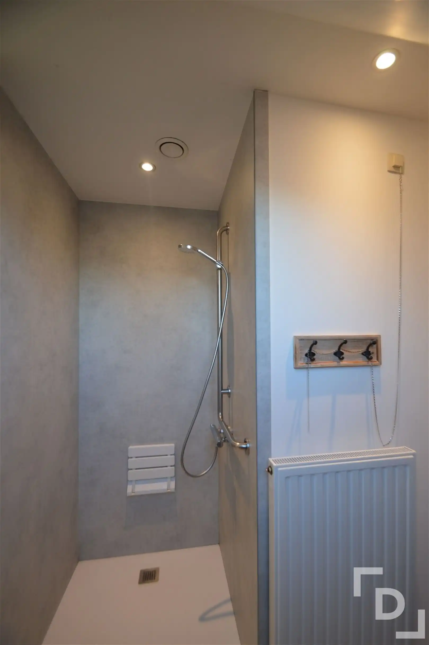 Dakappartement met zicht op het dorpsplein foto 8