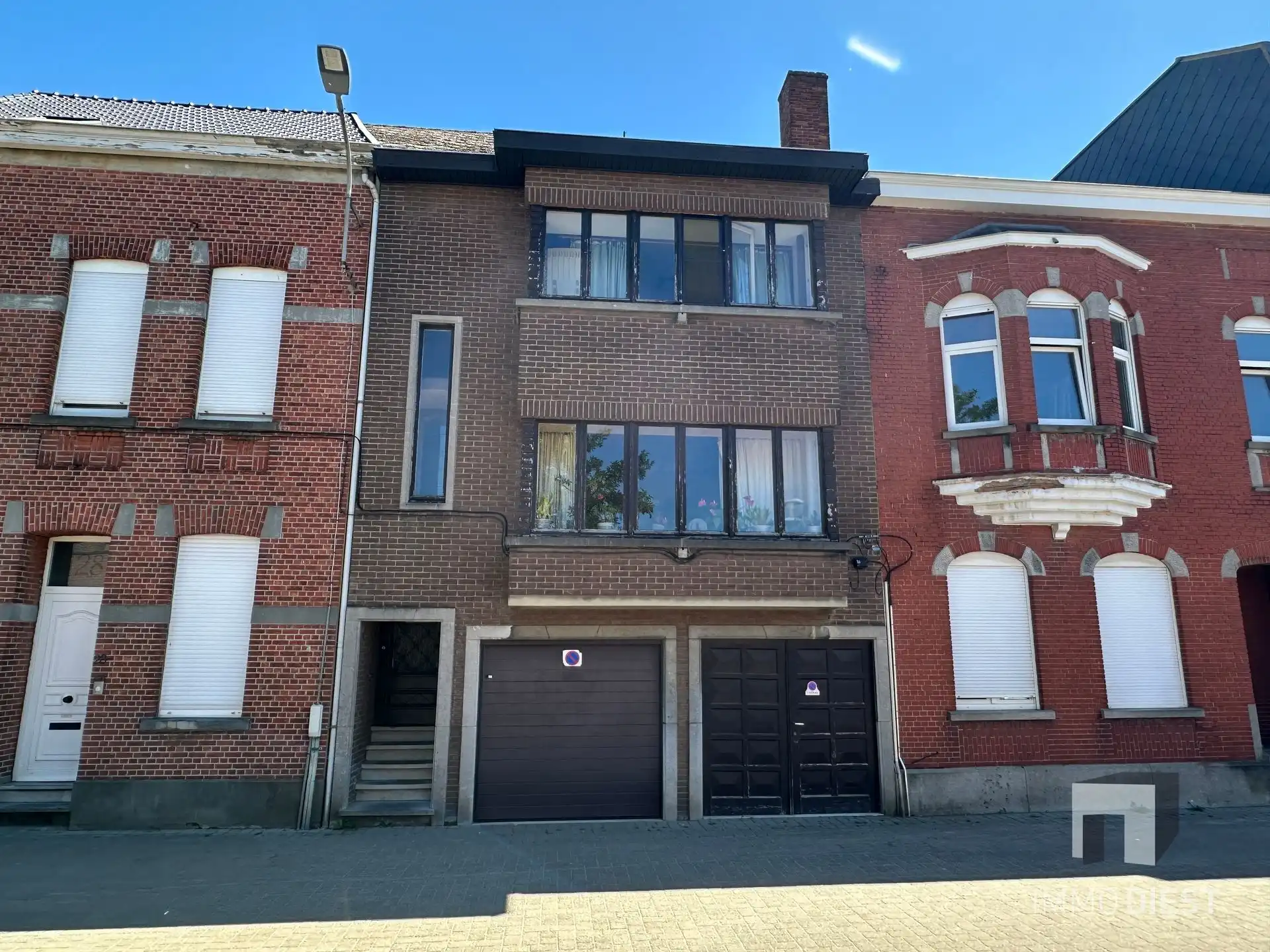 Te renoveren woning met 3 slaapkamers, 2 garages en tuin in Diest foto 2