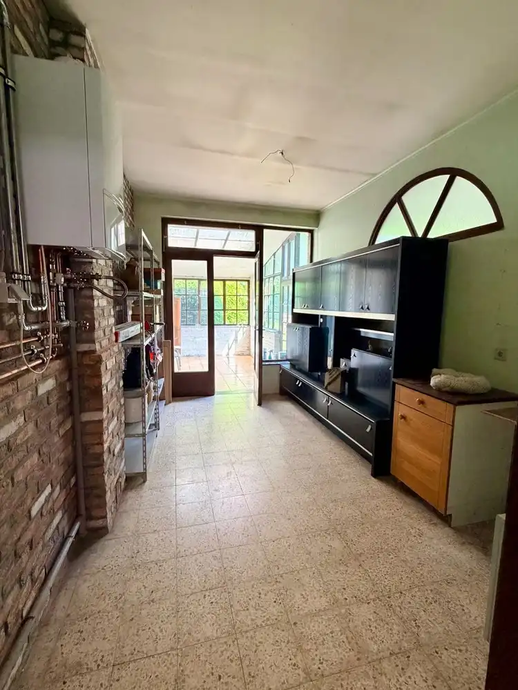 Ruime rijwoning met 4 slaapkamers, garage en tuin op toplocatie in Heverlee foto 10