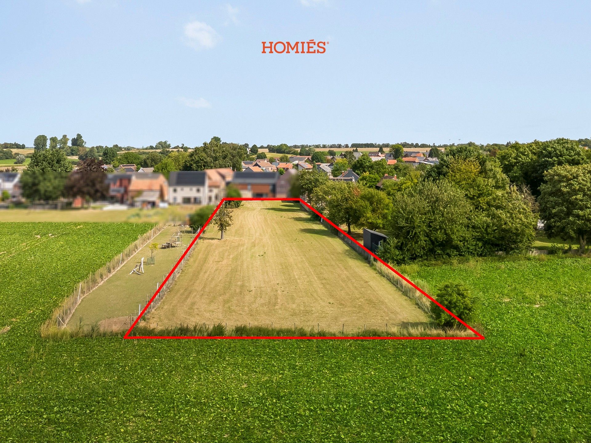 Bouwgrond 39a met uniek uitzicht in Hoegaarden foto {{pictureIndex}}