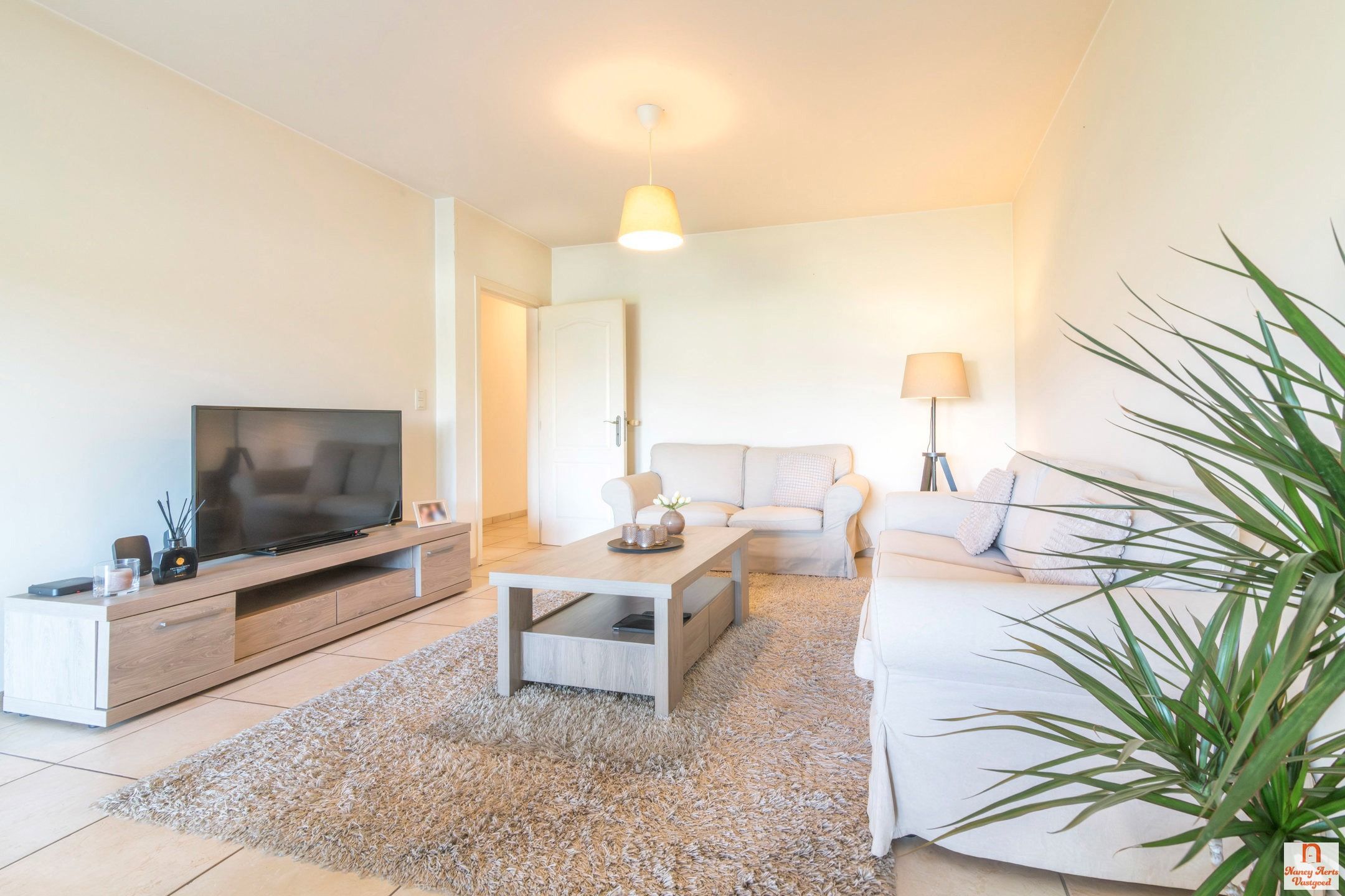 Lichtrijk gelijkvloers appartement met tuinzicht in Kuringen foto 4