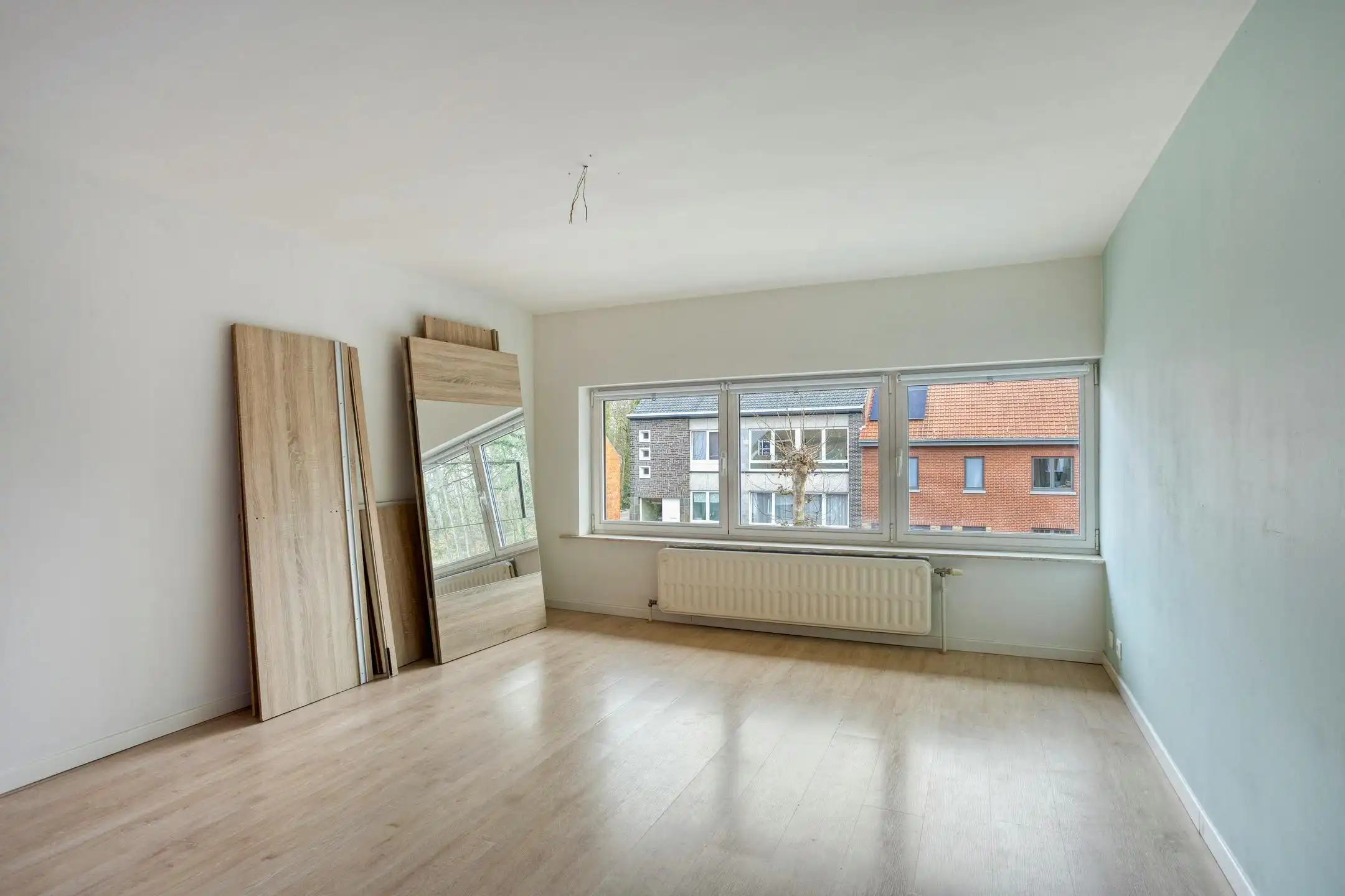 Driegevelwoning met extra studio/kantoor of praktijk, op een toplocatie in het centrum van Grimbergen! foto 11