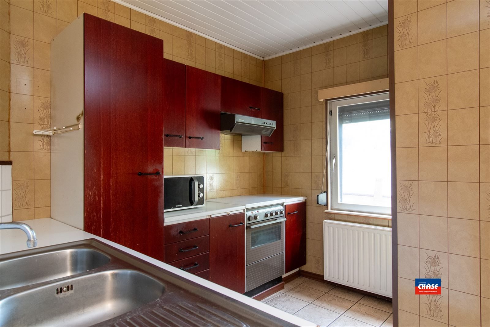 Rijwoning met 4/5 slaapkamers en tuin foto 6