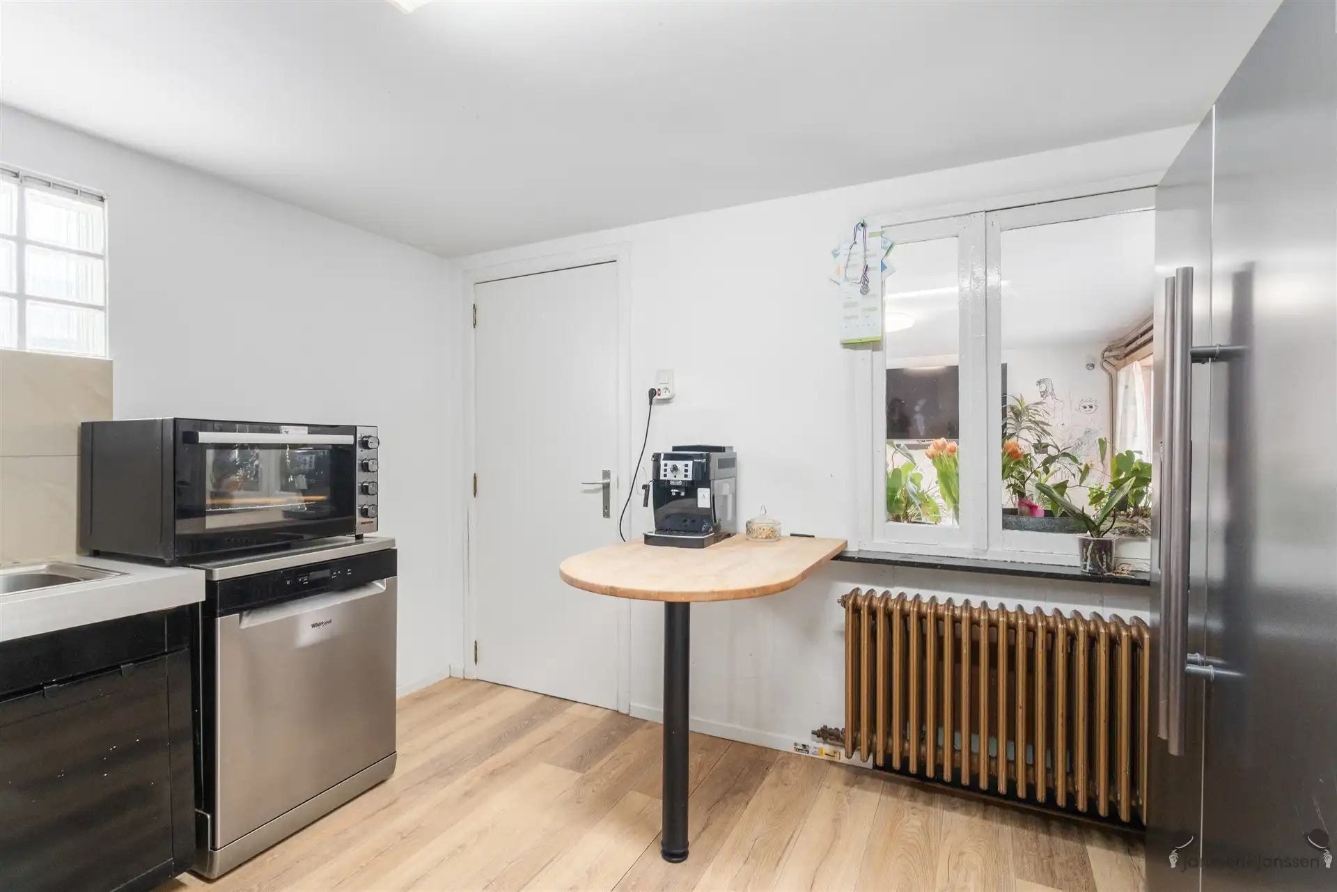 Vrijstaande woning met modern bijgebouw en renovatiepotentieel in groen Beverlo foto 8