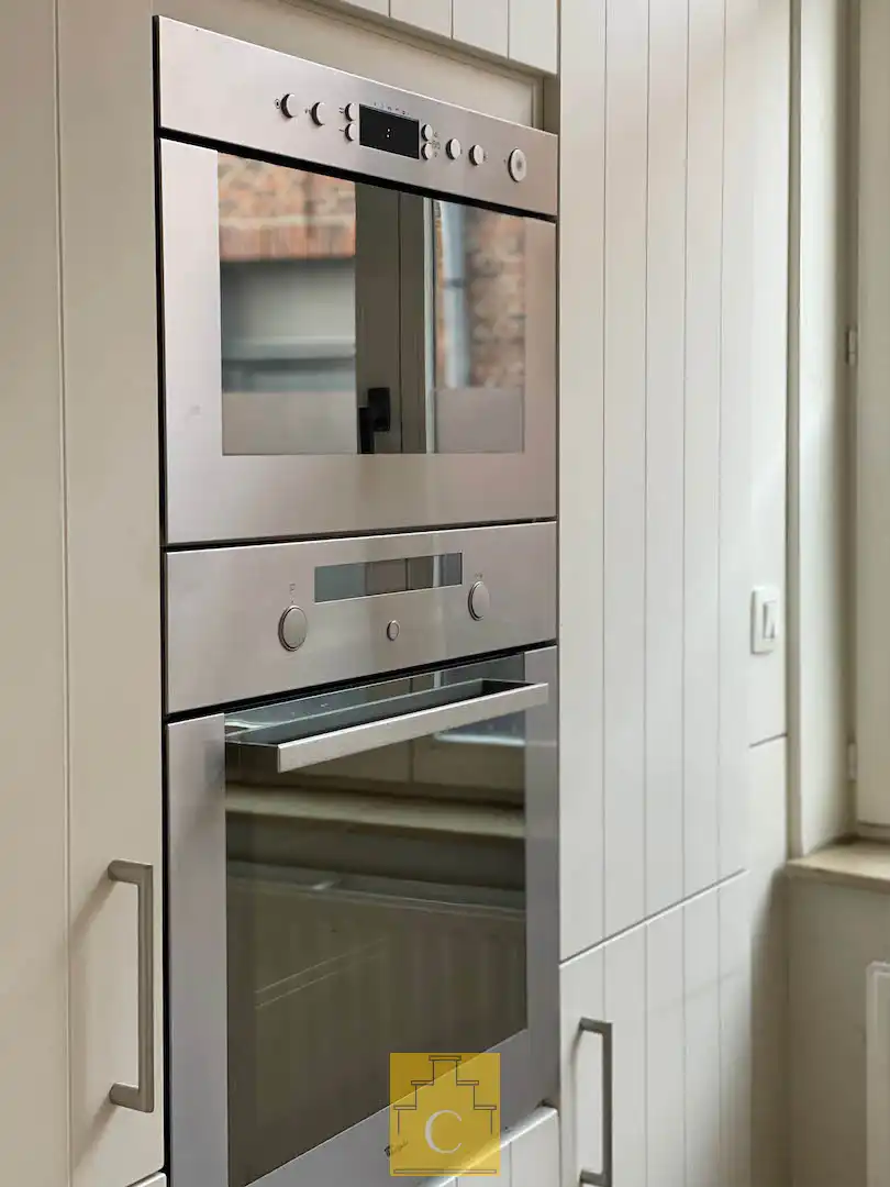 Instapklare trapgevelwoning met zonnig terrastuintje en grote berging, centrum, rustige straat omgeving ’t Zand foto 13