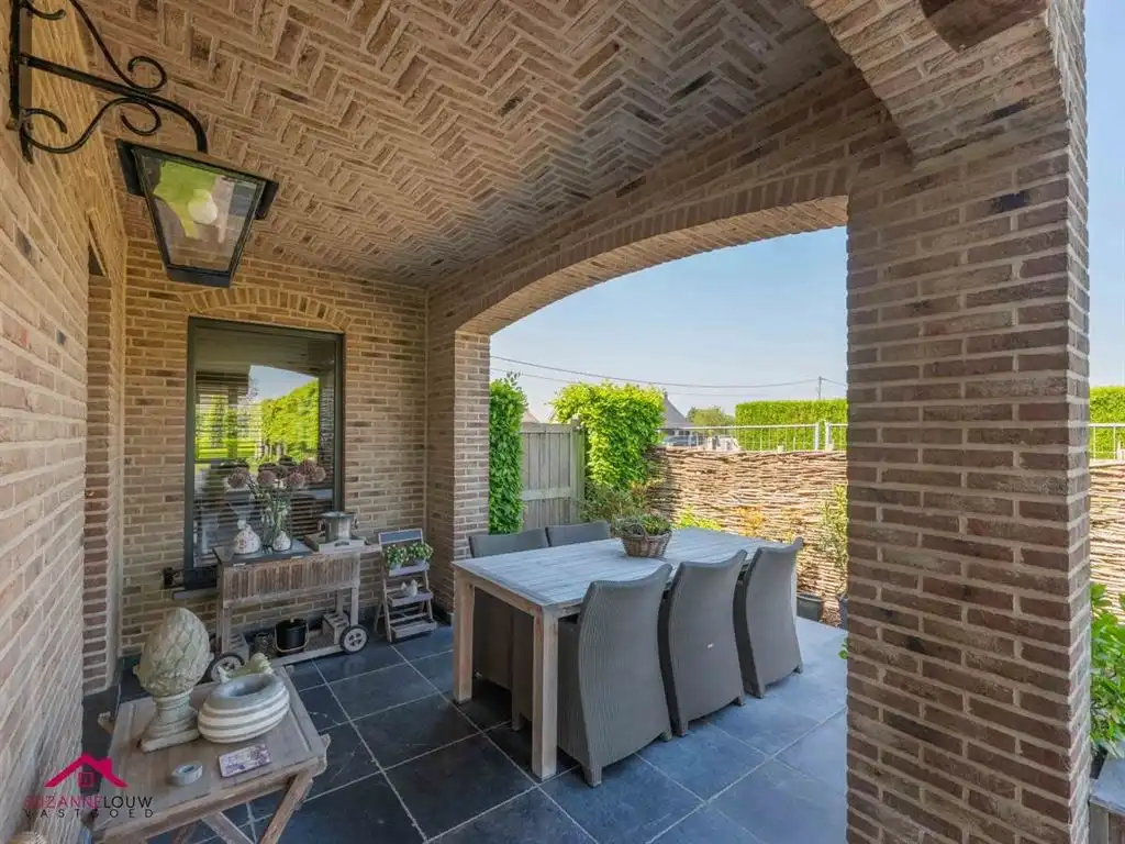 Charmante vrijstaande woning met sfeervol aangelegd terras foto 9