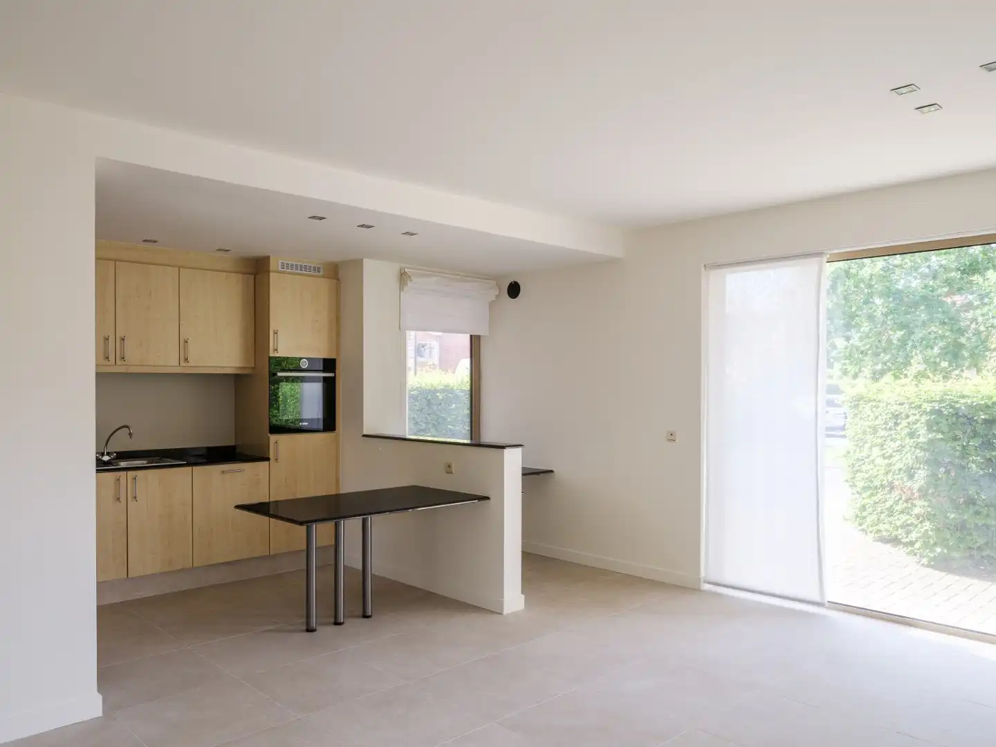 Instapklaar gelijkvloers appartement met 2 slaapkamers en zonnige privétuin foto 4