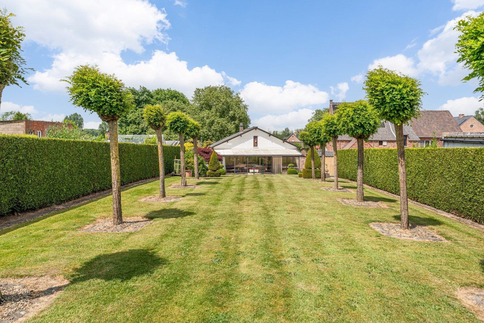 IN OPTIE - Verzorgde vrijstaande woning met mooie tuin op 11a 58ca, op enkele minuutjes van het centrum  foto 25