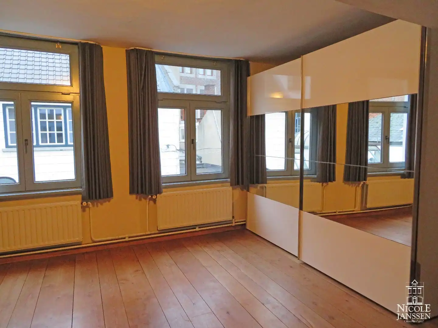 Charmant stadshuisje met drie slaapkamers en tuintje foto 12