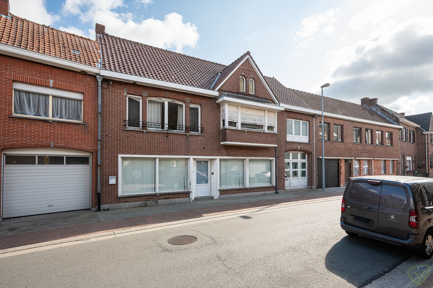 Woning met winkelruimte te koop in het centrum van Ursel foto 25