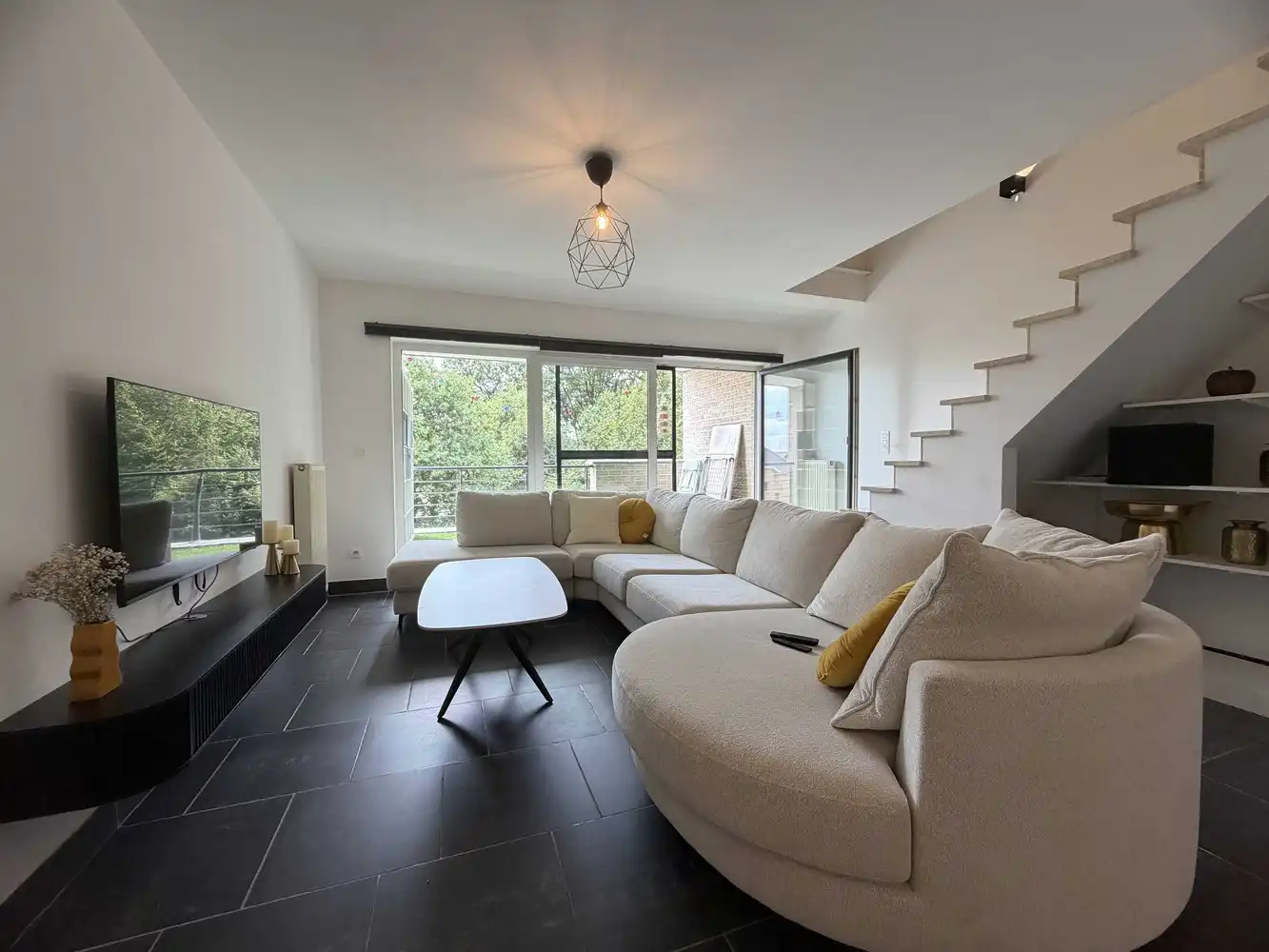 Duplexappartement met terras en ondergrondse staanplaats foto 2