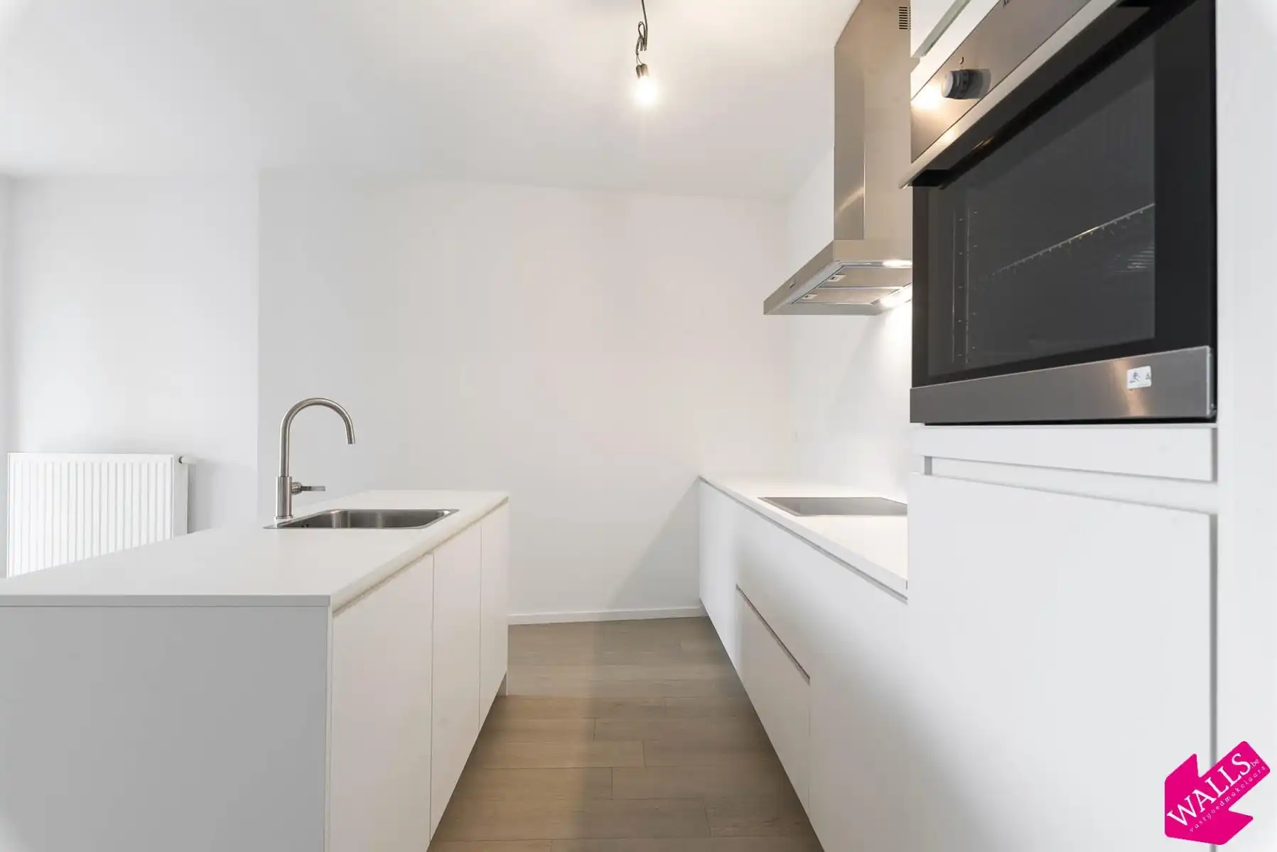 Energiezuinig appartement met 2 slk, terras en P nabij Boekenbergpark foto 3