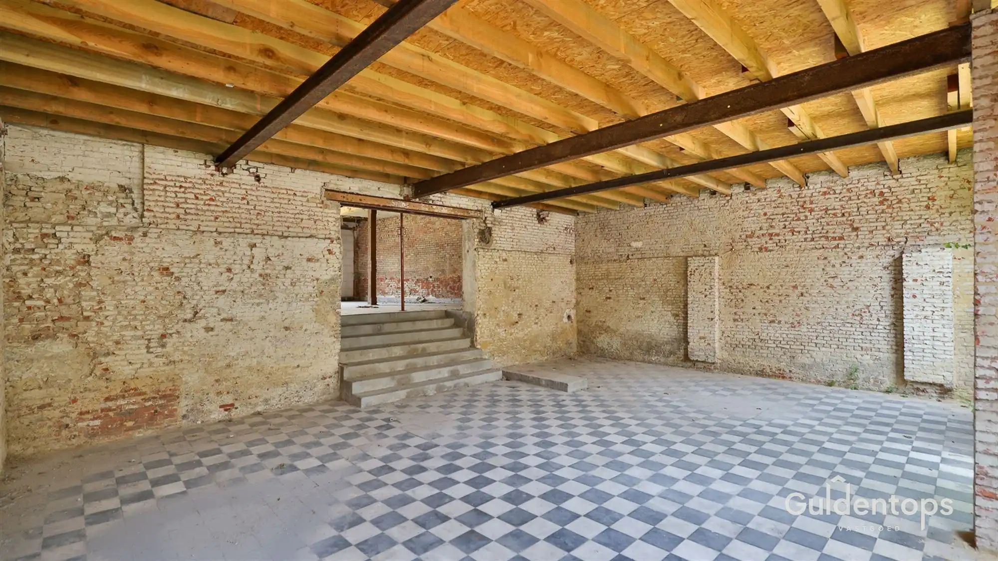 Knap gelijkvloers appartement in hartje Lier met grote tuin foto 22