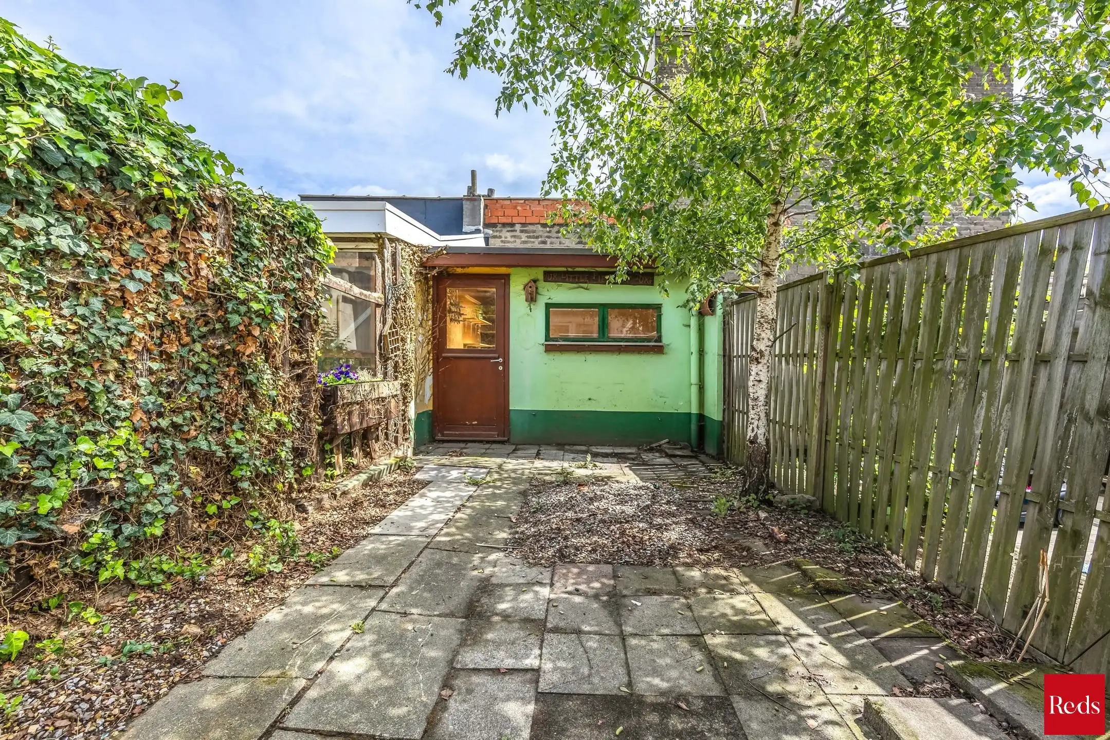 te renoveren woning met 3 ruime slaapkamers , garage en tuin foto 10