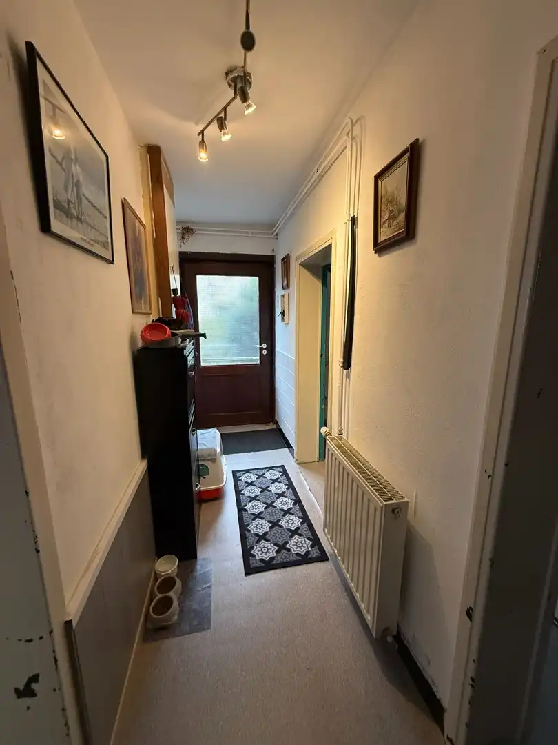 Opbrengsteigendom bestaande uit 2 halfopen woningen met garage en tuin te Hechtel. foto 23