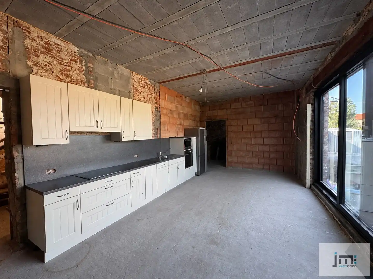 Ruime gezinswoning met tal van mogelijkheden op een perceel van 2.140 m² in het landelijke Horpmaal foto 4