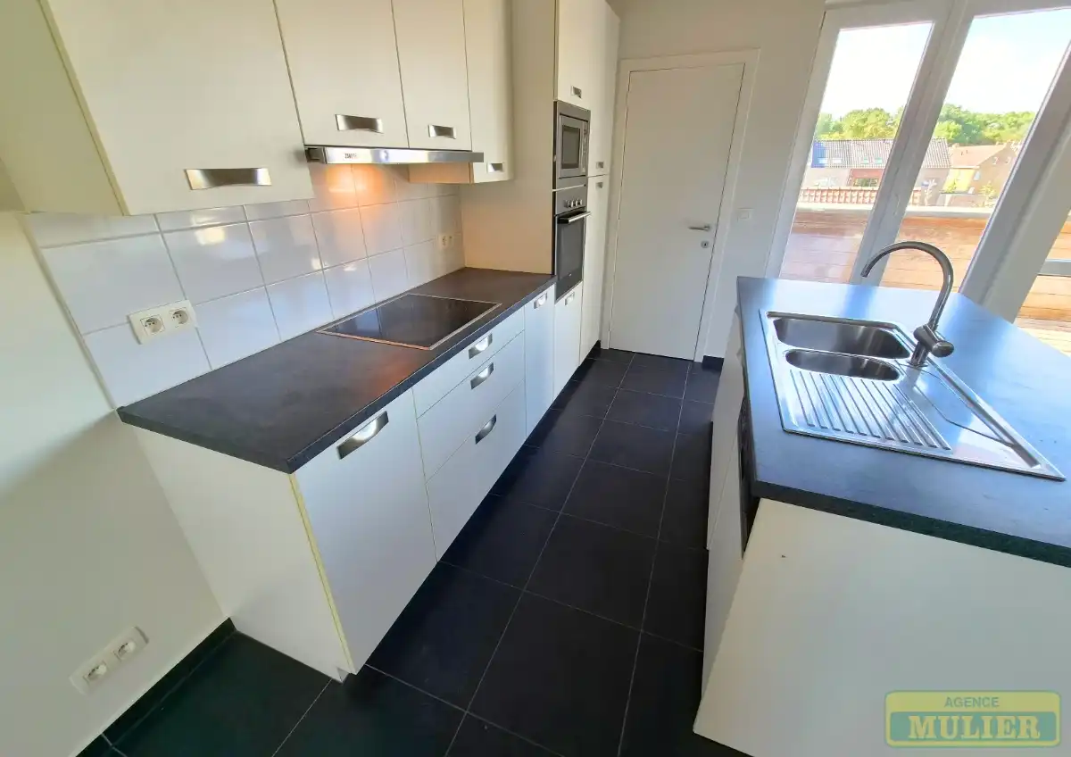 MODERN APPARTEMENT AAN DE ZONNEKANT TE KOOP IN DE PANNE foto 9