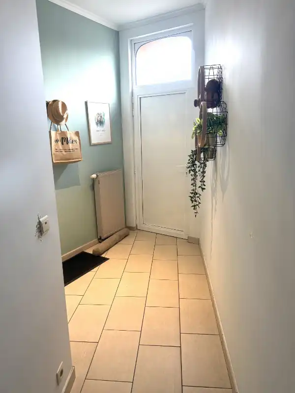 Mooie, gezellige woning met drie slaapkamers en tuin. foto 2