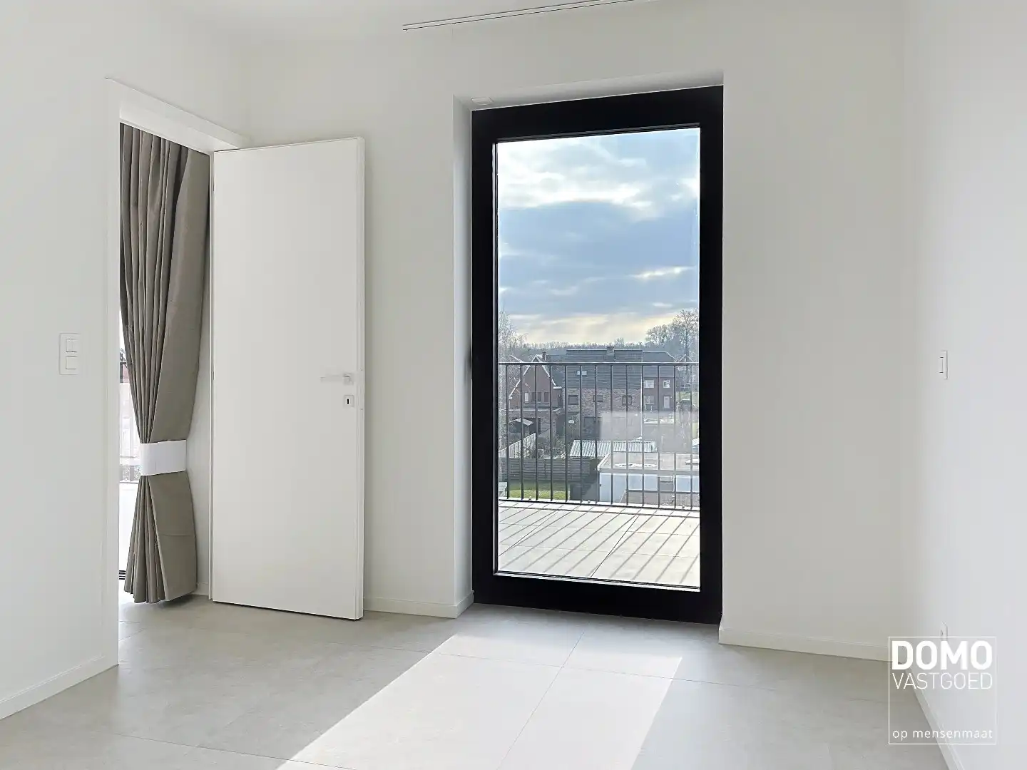 Penthouse met twee slaapkamers, ruim terras en autostandplaats te Kermt foto 5