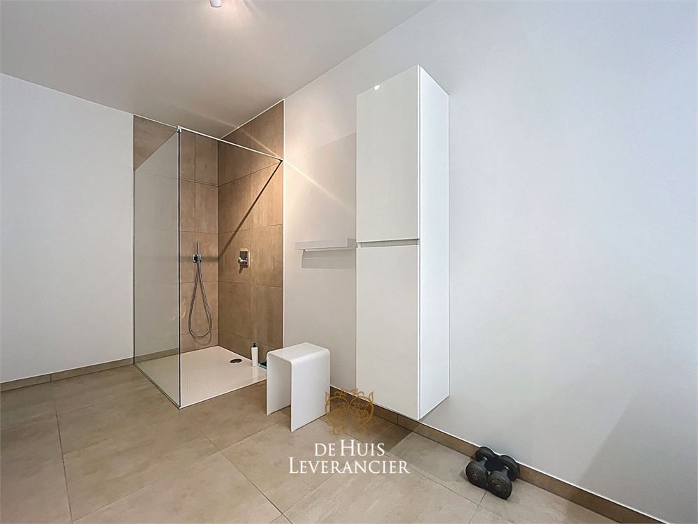 Discrete luxe & tijdloze elegantie : subliem nieuwbouwappartement met terras en gemeenschappelijk tuin te koop in Boechout foto 10